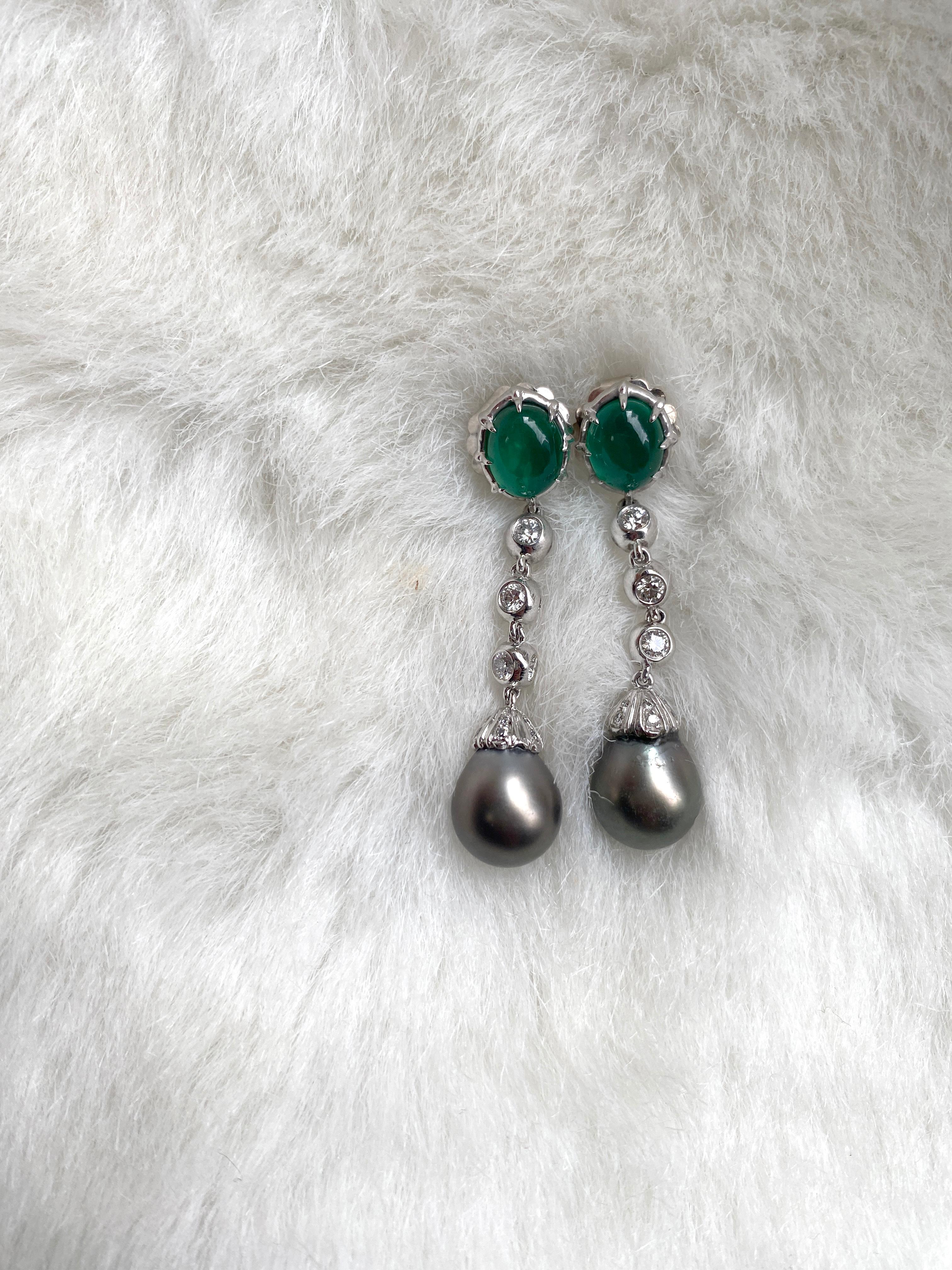 Emerald Oval Cabs And Grey Pearl Long Earrings with Diamonds in Platinum, from 'G-One' Collection. If you want to make a statement, these are the perfect earrings to do it! 

* Gemstone: 100% Earth Mined 
* Approx. gemstone Weight: 3.62 Carats