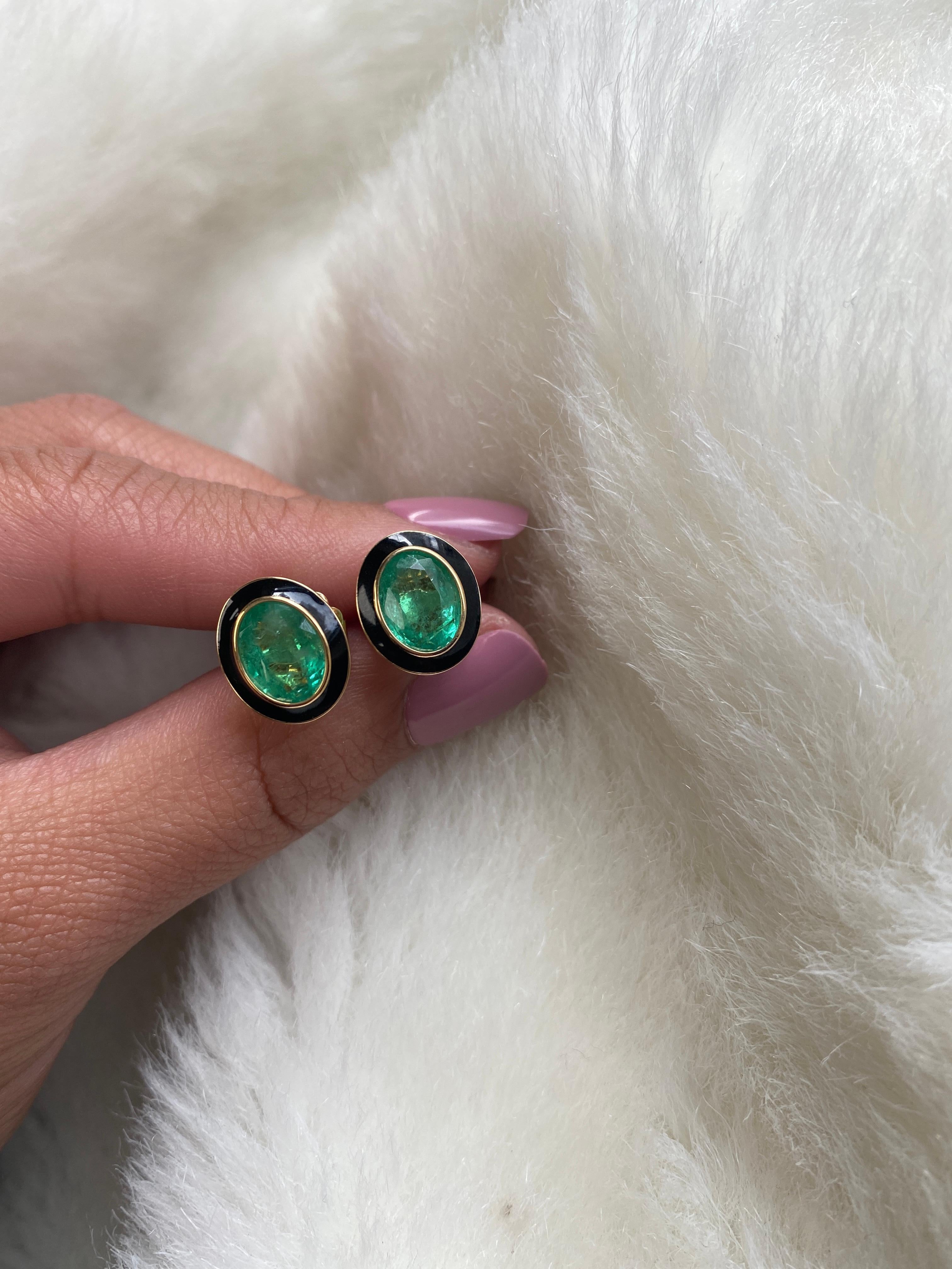 Emerald Oval Studs with Black Enamel in 18K Yellow Gold, from 'Queen' Collection. The combination of enamel, and Emerald represents power, richness and passion of a true Queen. The feeling of luxury is what we’re aiming for, but at a price point