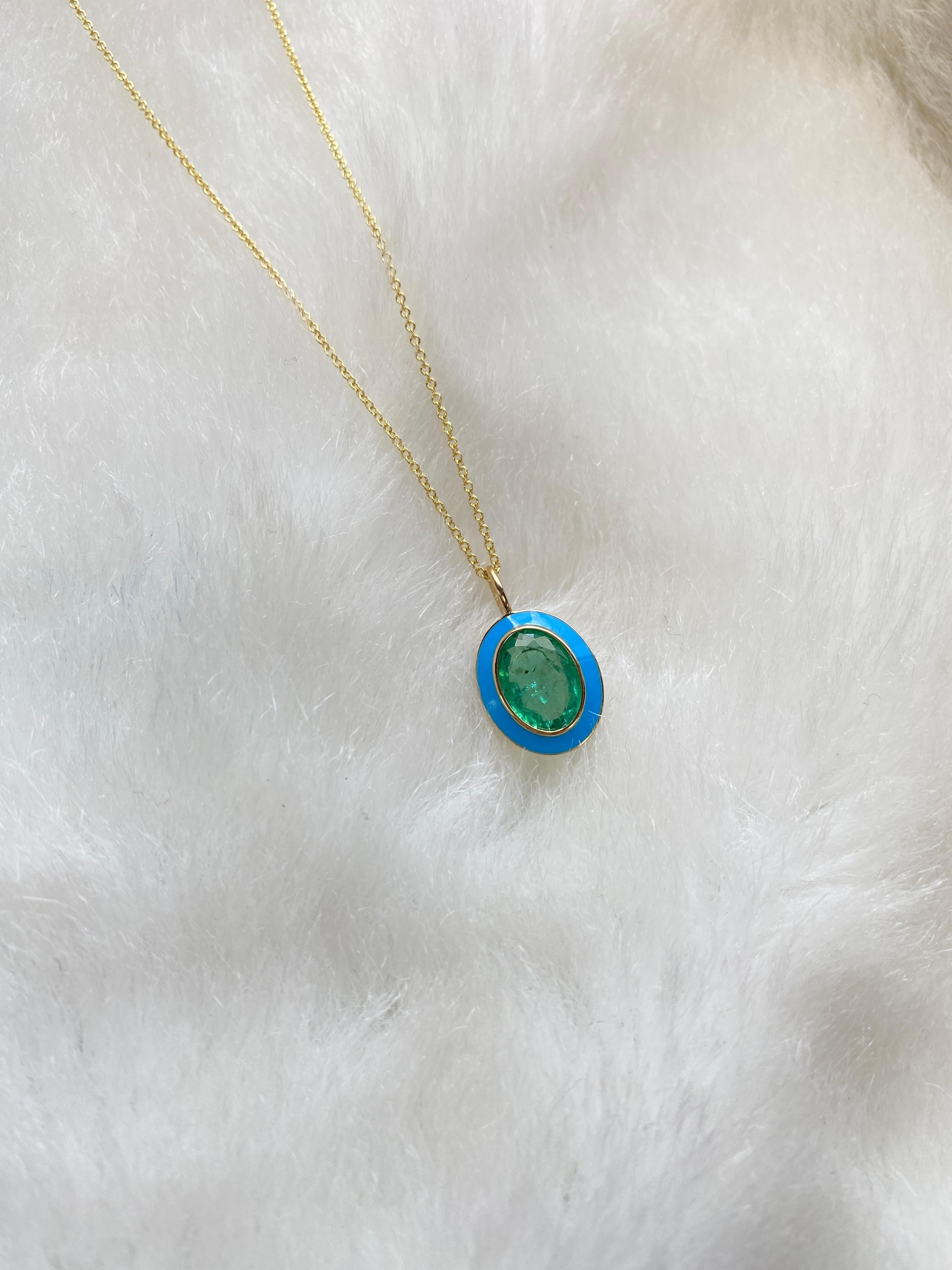 Emerald Oval Pendant with Turquoise Enamel in 18K Yellow Gold, from 'Queen' Collection. The combination of enamel, and Emerald represents power, richness and passion of a true Queen. The feeling of luxury is what we’re aiming for, but at a price