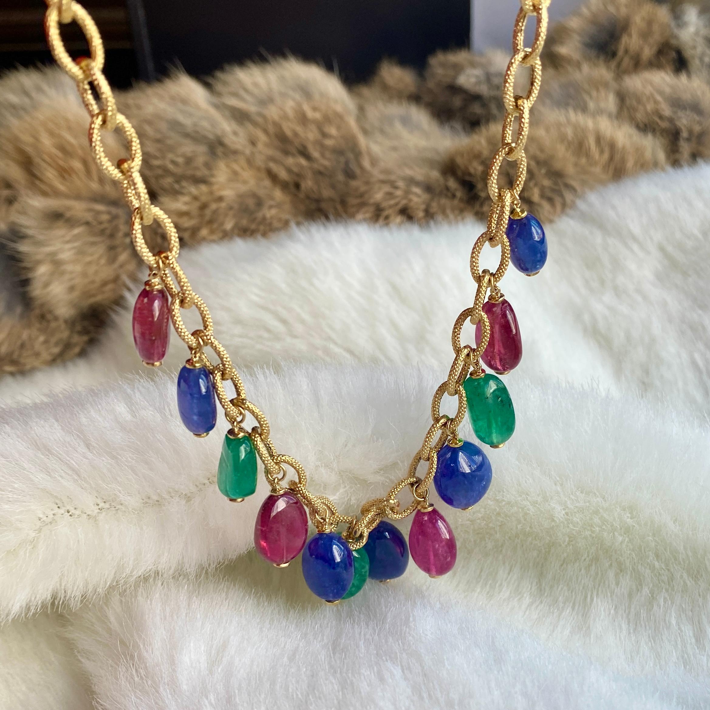 Emerald, Tanzanite and Rubelite Tumble Bead Frosted Chain Necklace in 18K Yellow Gold form 'G-One' Collection

Gemstone Weight: 105 Carats

Length: 16