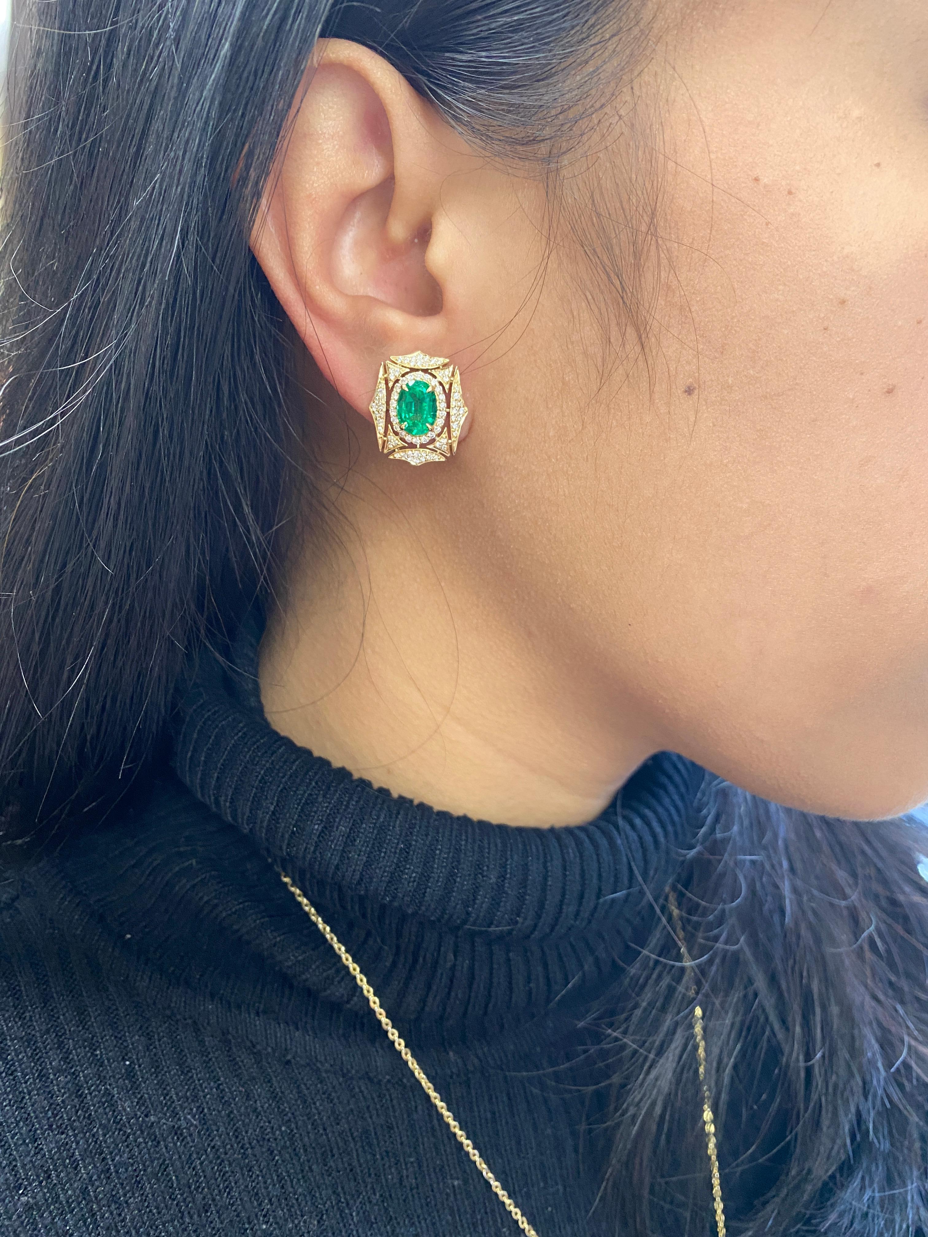 Faceted Oval Emerald and Diamond Web Earrings in 18K Yellow Gold, from ‘G-One' Collection. Elegance and uniqueness, all in one piece!

* Gemstone size: 8 x 6 mm
* Gemstone: 100% Earth Mined 
* Approx. gemstone Weight: 2.58 Carats (Emerald)

* 100%