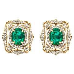 Facettierte ovale Smaragd- und Diamant-Web-Ohrringe vonshwara