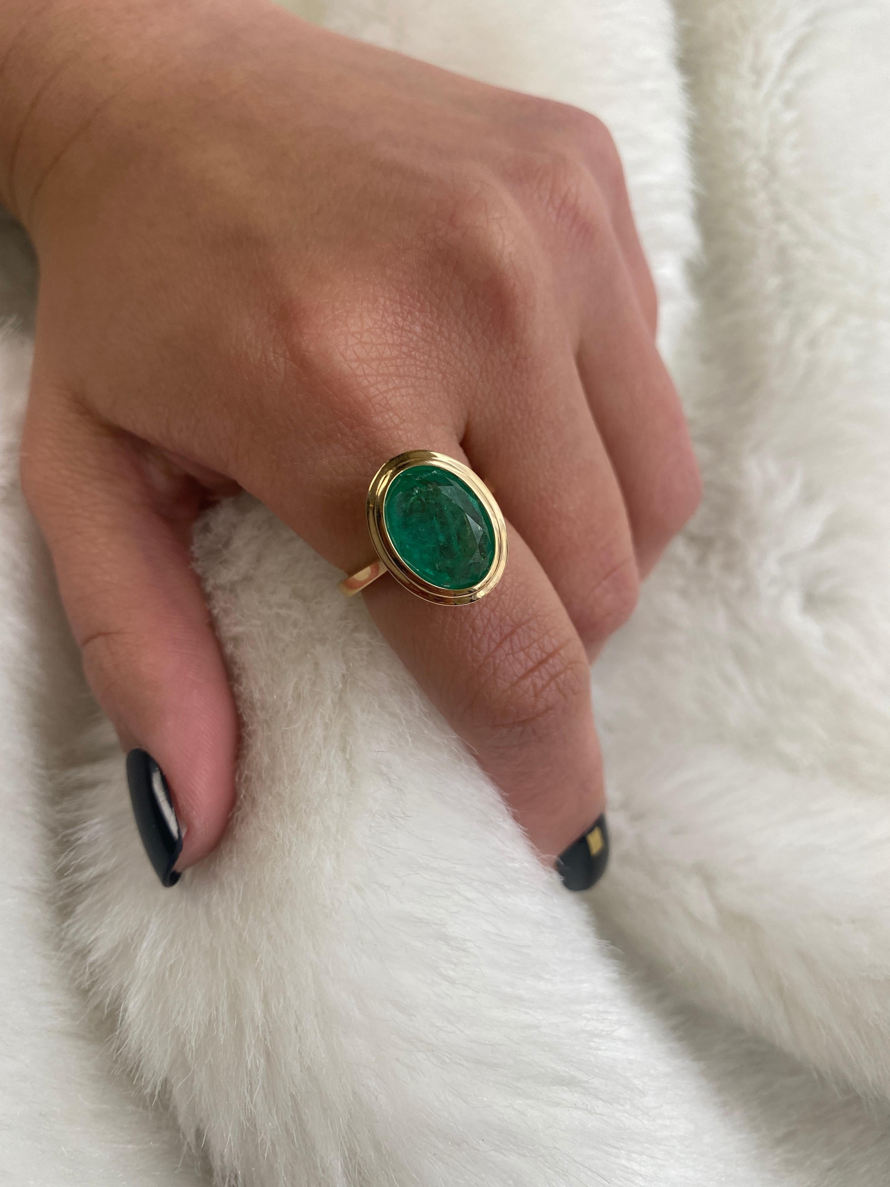 Unique and sophisticated Faceted Oval Emerald Ring in 18K Yellow Gold, from 'G-One' Collection

* Gemstone: 100% Earth Mined 
* Approx. gemstone Weight: 5.68 Carats (Emerald)

* Cut: Oval
* Metal: 18K Yellow Gold