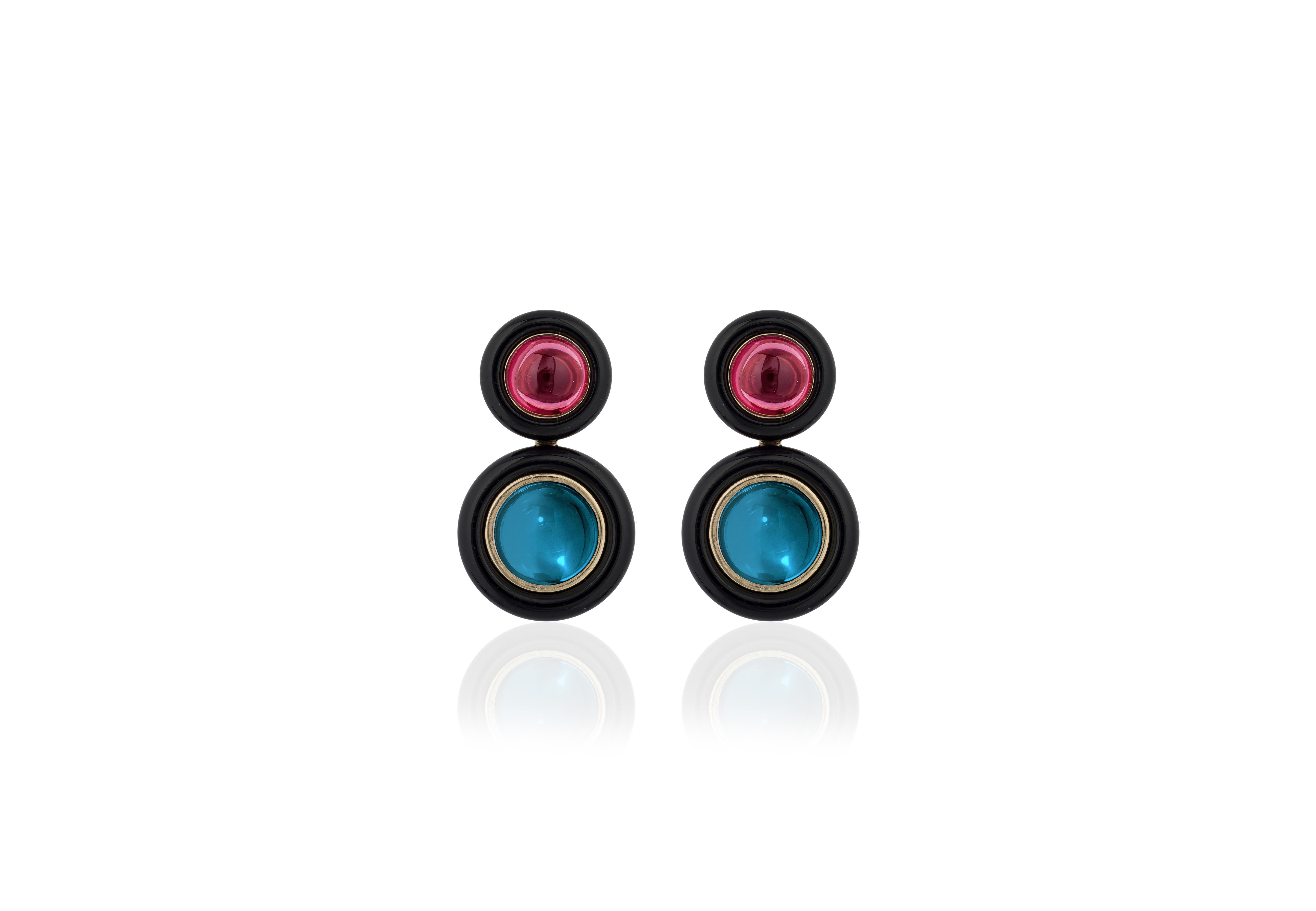 Garnet and London Blue Topaz Cabochon Earrings with Onyx ring Surround in 18K Yellow Gold, from 'Limited Edition' Collection. These limited edition items are just that! Limited! 

Feel the exclusiveness in every piece from this collection and Feel