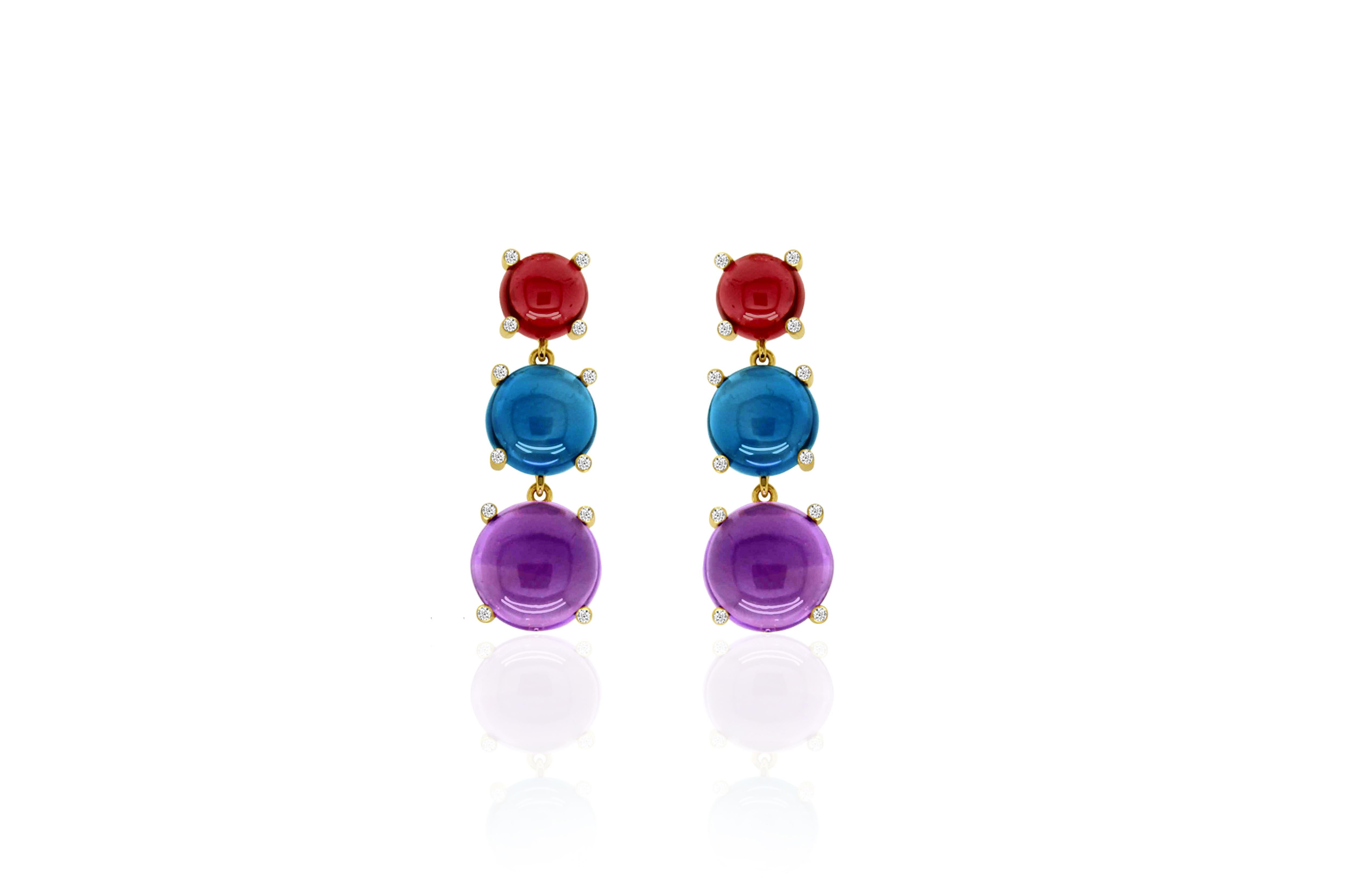 A very special statement piece is this Garnet, London Blue Topaz, Amethyst Cabs with Citrine Long Drop Earrings in 18K Yellow Gold, from our ‘Naughty’ Collection. This collection has dangerous curves tied with exotic colors. When unveiled, this