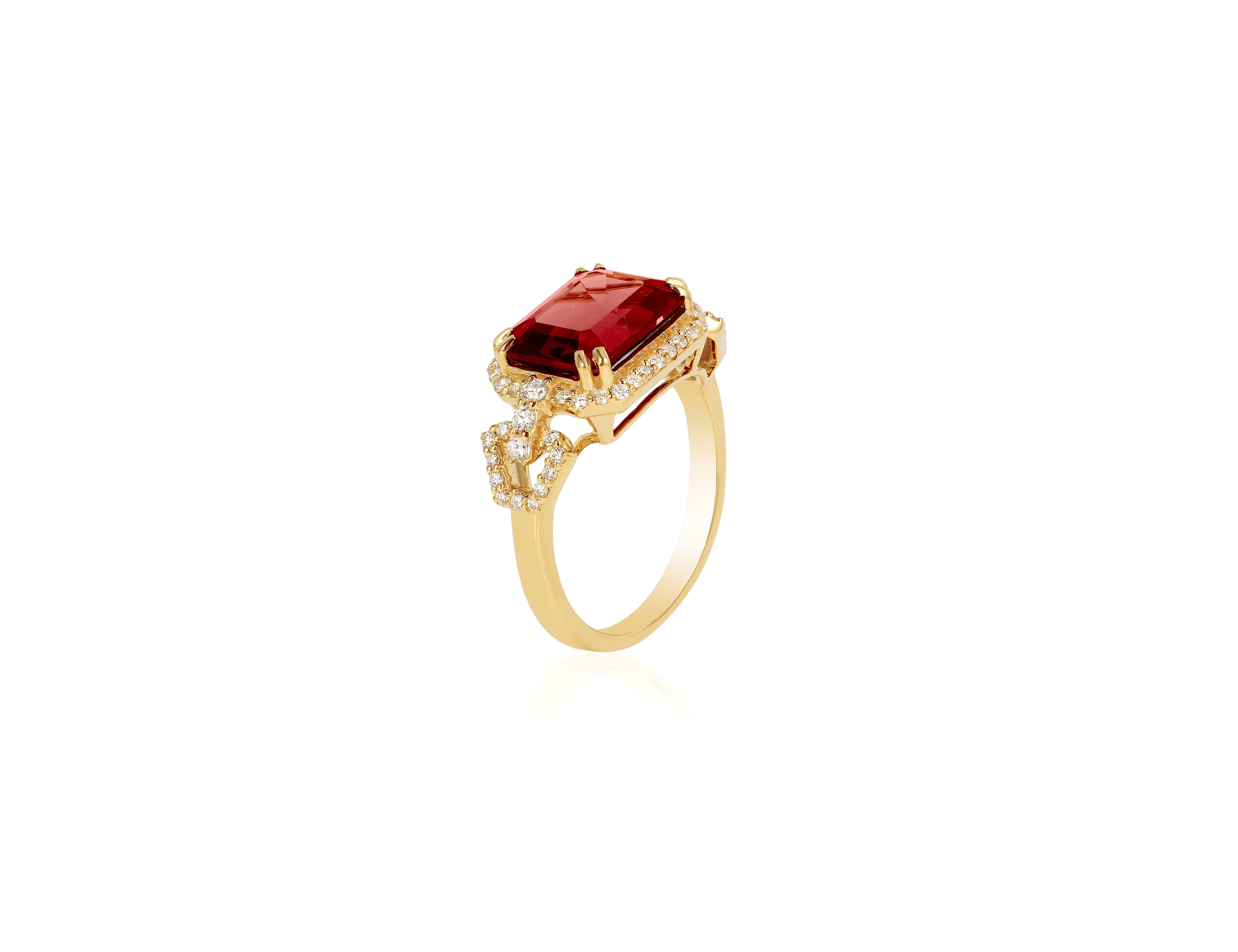 Garnet Small East-West Emerald Cut Ring with Diamonds in 18K Yellow Gold, From 'Gossip' Collection

Stone Size: 8 x 10 mm

Gemstone Approx Wt: Garnet- 3.25 Carats

Diamonds: G-H / VS, Approx Wt: 0.34 Carats 