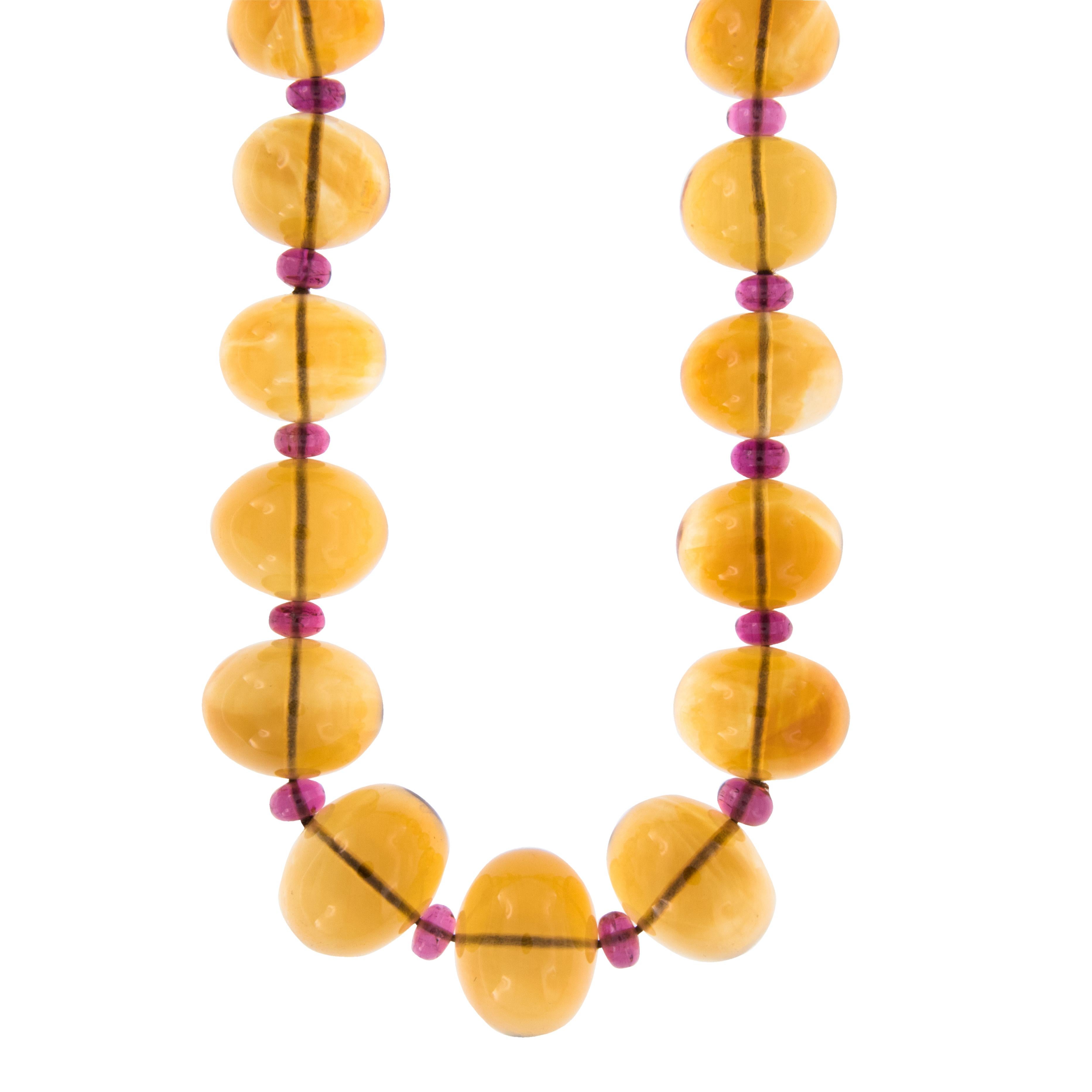 Goshwara, a term for perfect shape, is a company known for exceptional color gems and this 18 karat yellow gold Beyond beaded necklace features 418 Cttw. citrines,  & 35  Cttw. rubelites. Go beyond expectations & Go Beyond limits with this precious