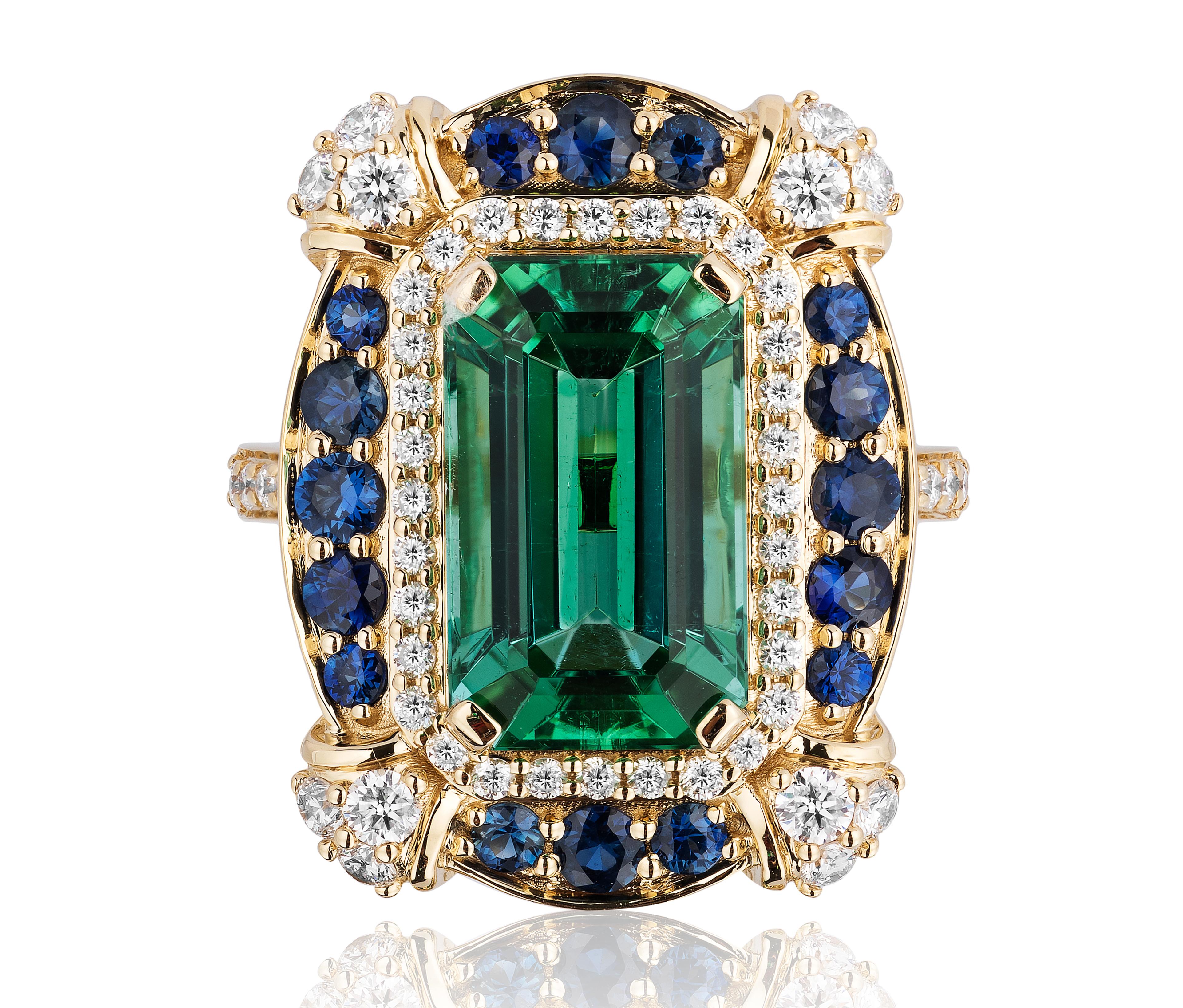 Green Tourmaline Emerald Cut Ring with Diamonds in 18K Yellow Gold, from 'G-One' Collection 

Approx. Wt: 7.09 Carats (Tourmaline), 0.94 Carats (Sapphire) 

Diamonds: G-H / VS, Approx. Wt: 0.75 Carats 