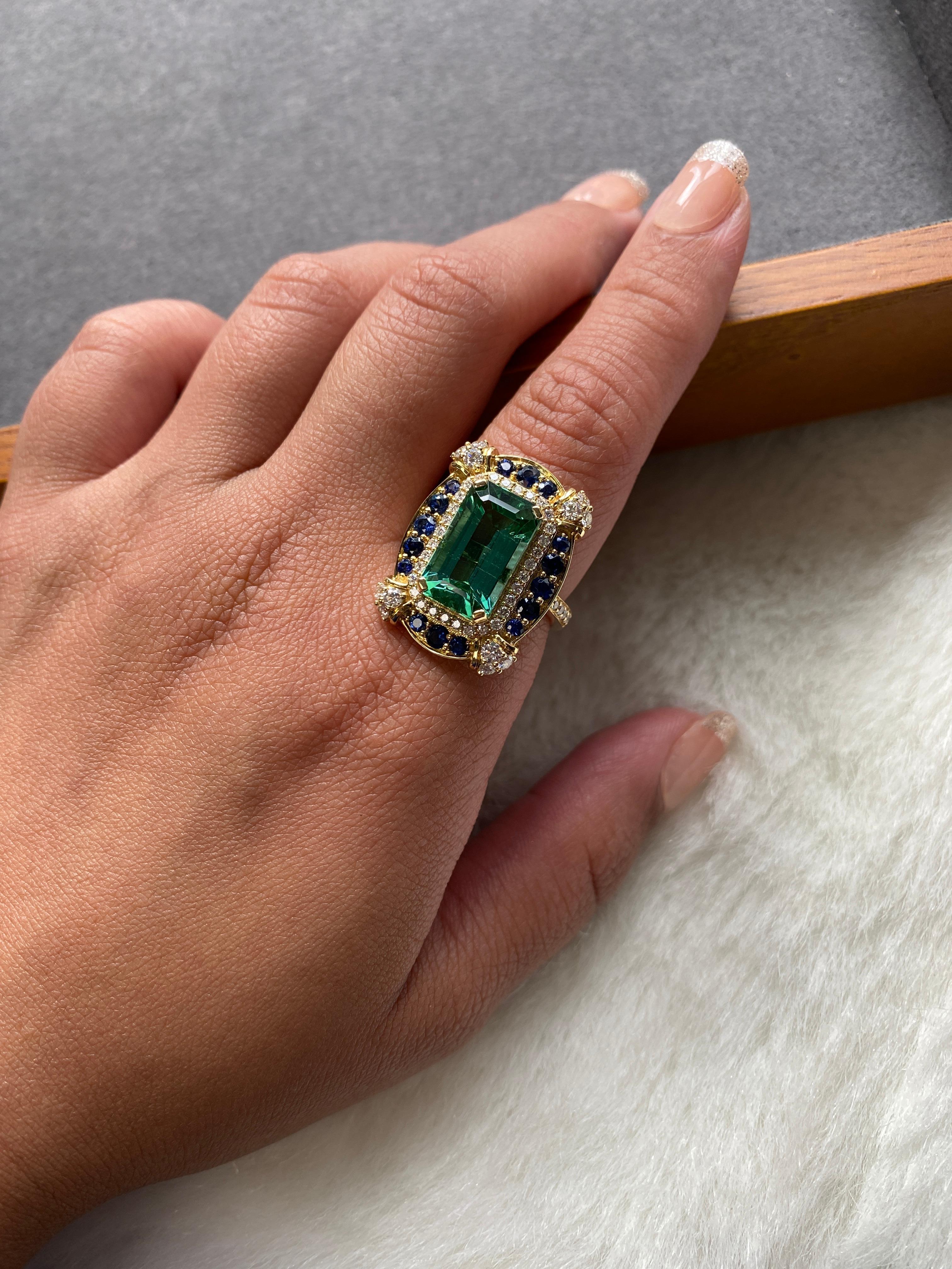 green sapphire emerald cut ring