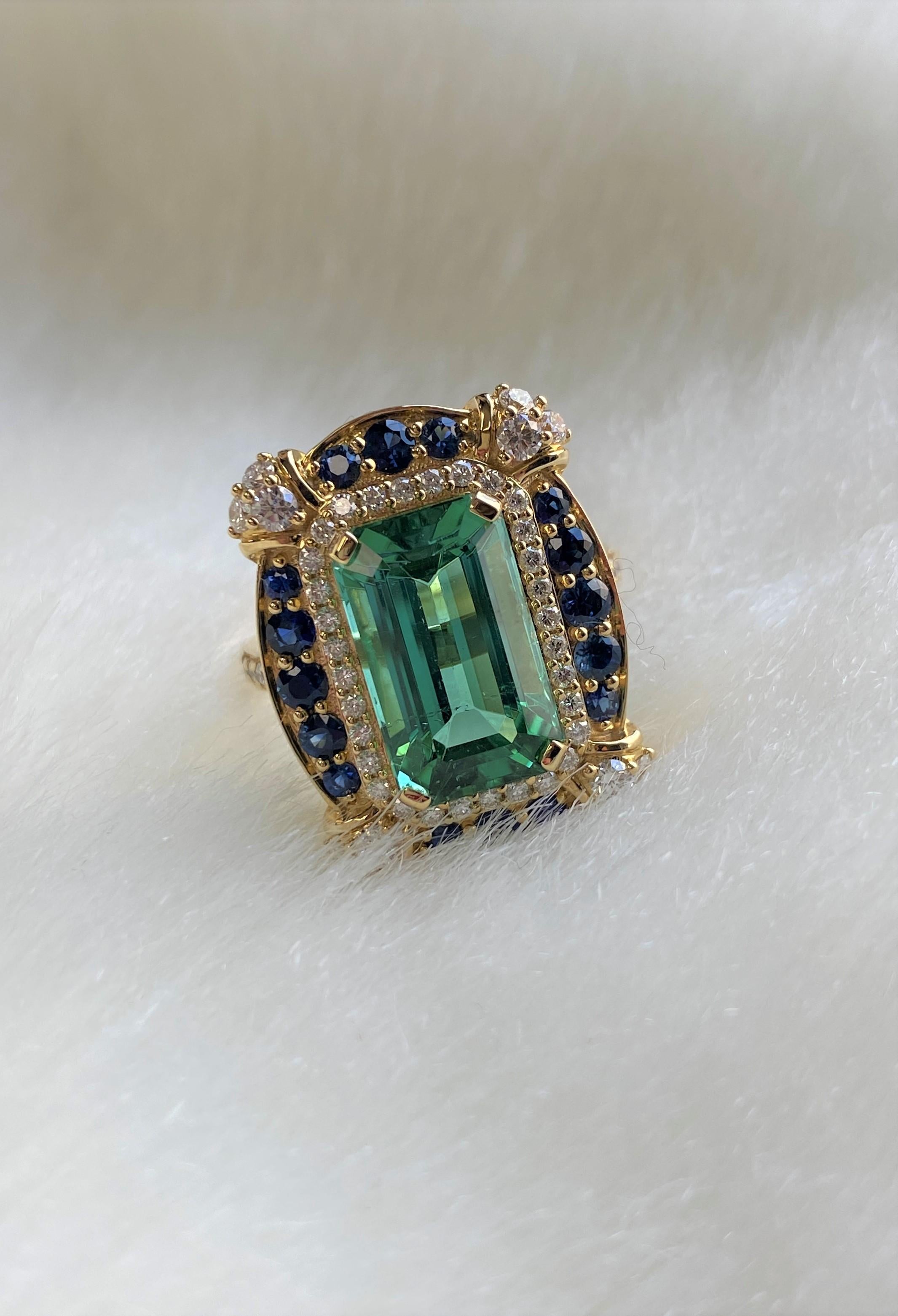 Goshwara Green Tourmaline Emerald Cut with Diamonds and Sapphire Ring In New Condition For Sale In New York, NY