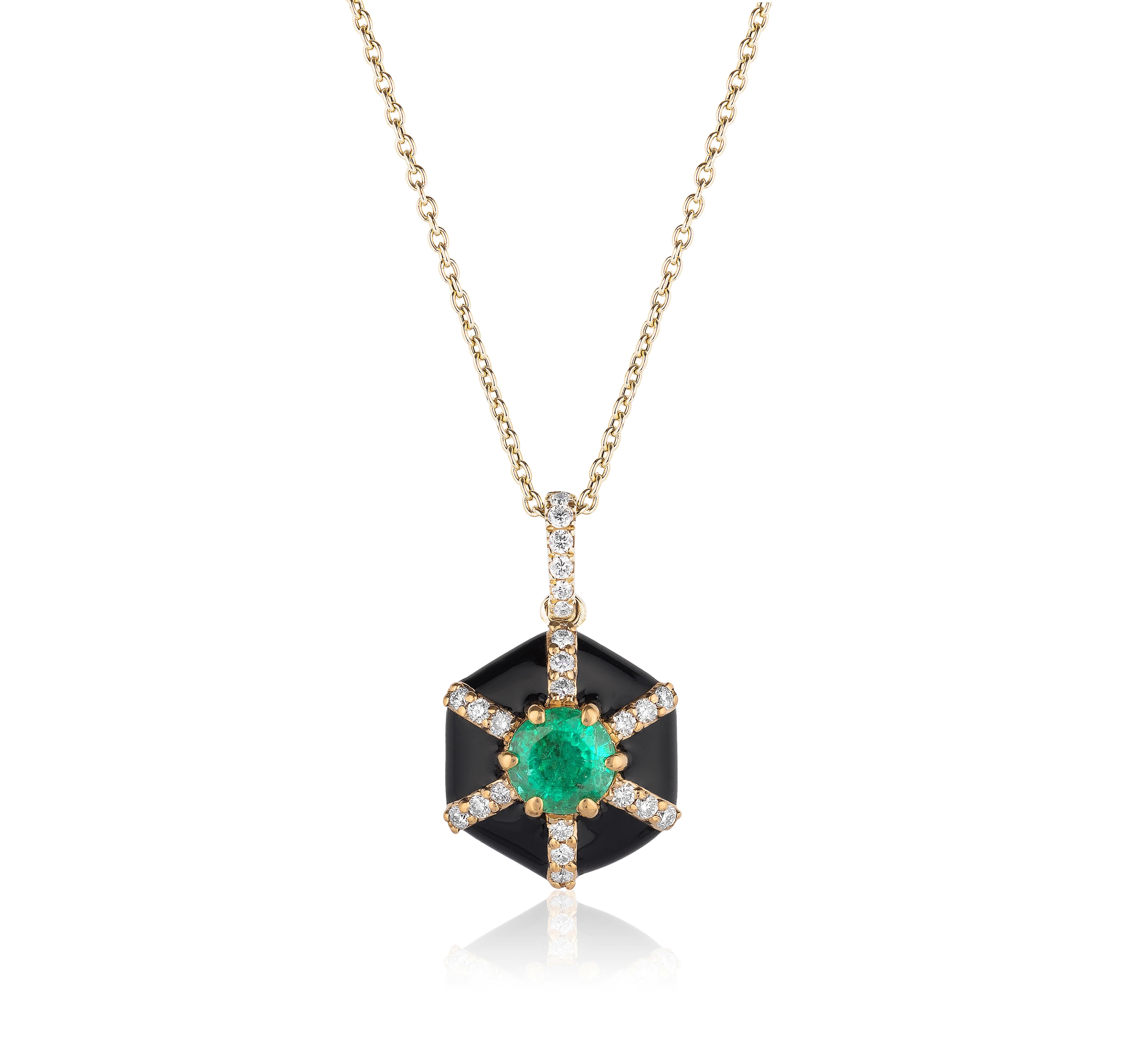 Hexagon Black Enamel Pendant with Emerald and Diamonds in 18K Yellow Gold. from ‘Queen’ Collection

Stone Size: 4 mm

Diamonds: G-H / VS, Approx. Wt: 0.10 Carats 
