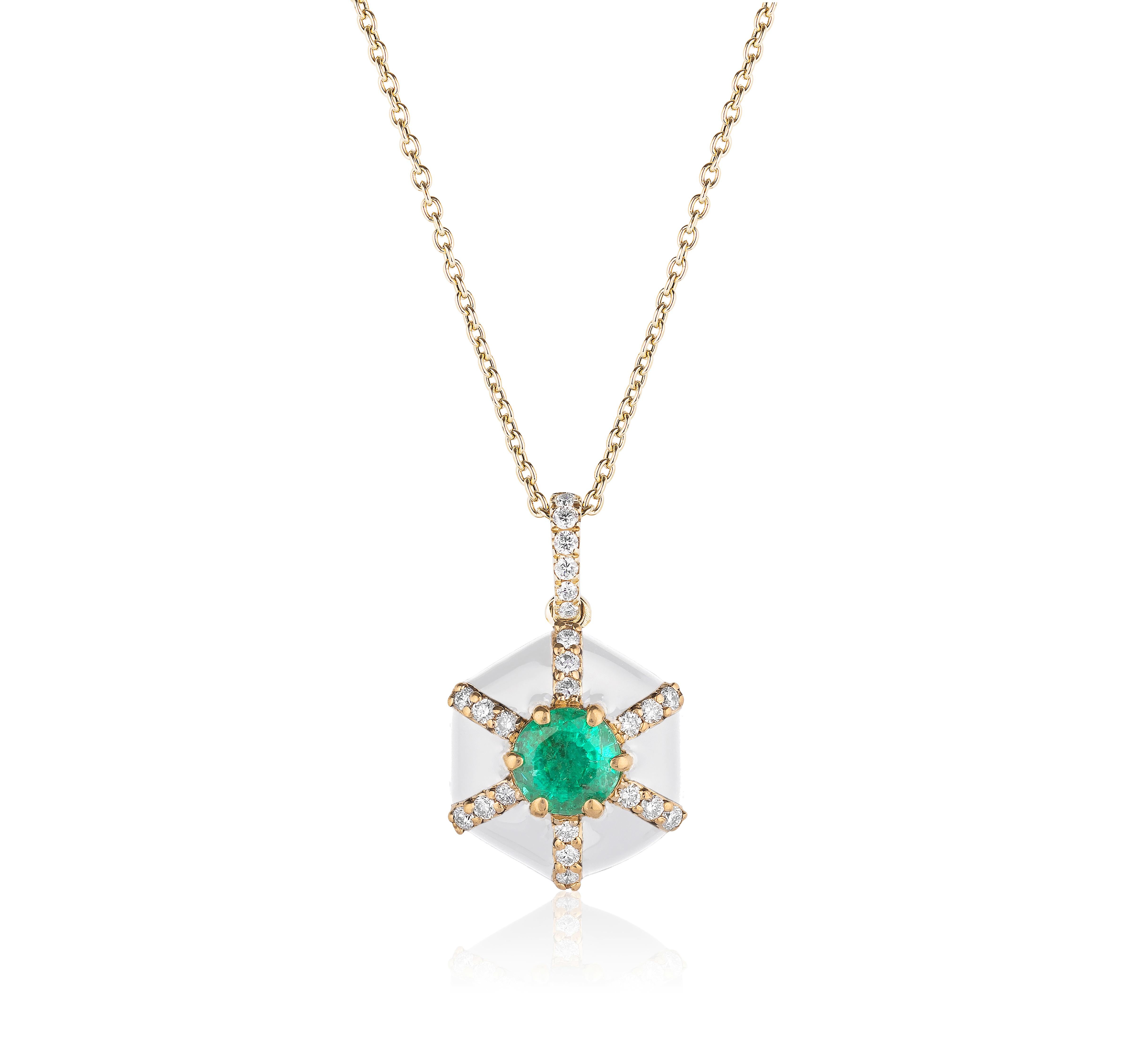 'Queen' Hexagon White Enamel Pendant with Emerald And Diamond in 18K Yellow Gold.
Stone Size: 5 x 3 mm 
Gemstone Approx. Stone Wt: 0.21 Carats 
Diamonds: G-H / VS, Approx. Wt: 0.09 Carats