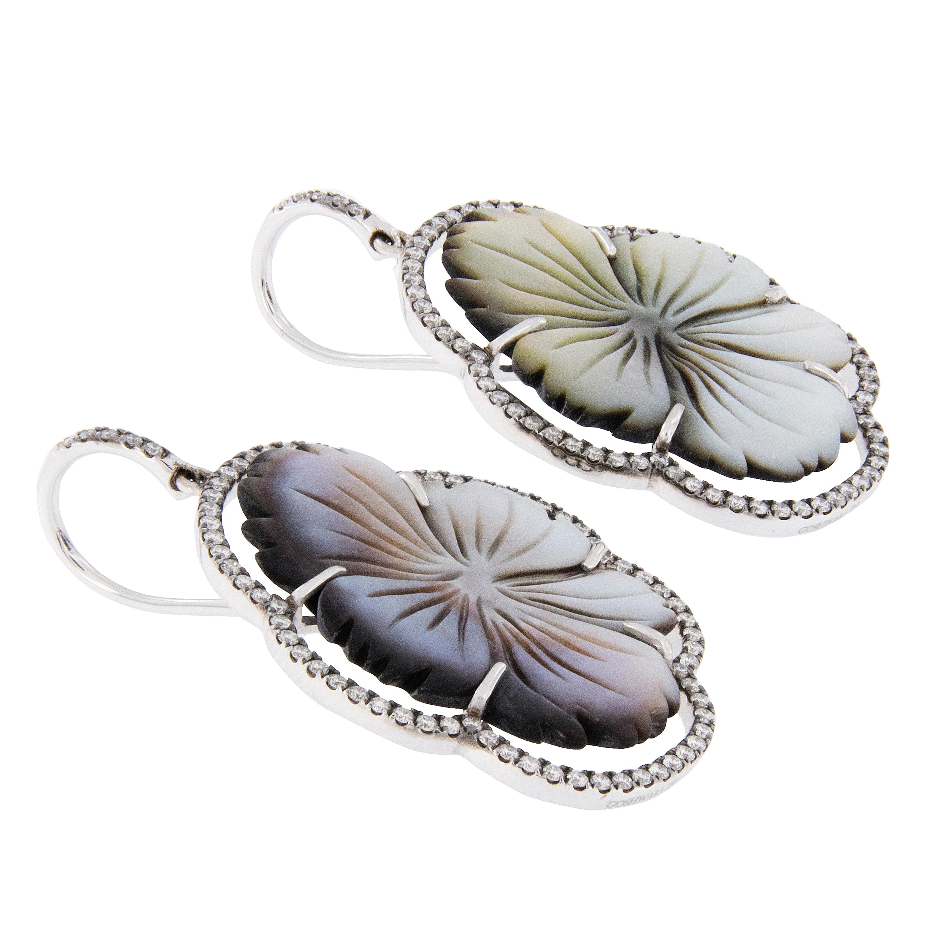 Goshwara, a term for perfect shape, is a company known for exceptional color gems and this 18 karat white gold carved floral earrings with carved grey mother of pearl = 23.86 Cttw & 1.07 Cttw diamonds is no exception! The Innate Collection uses