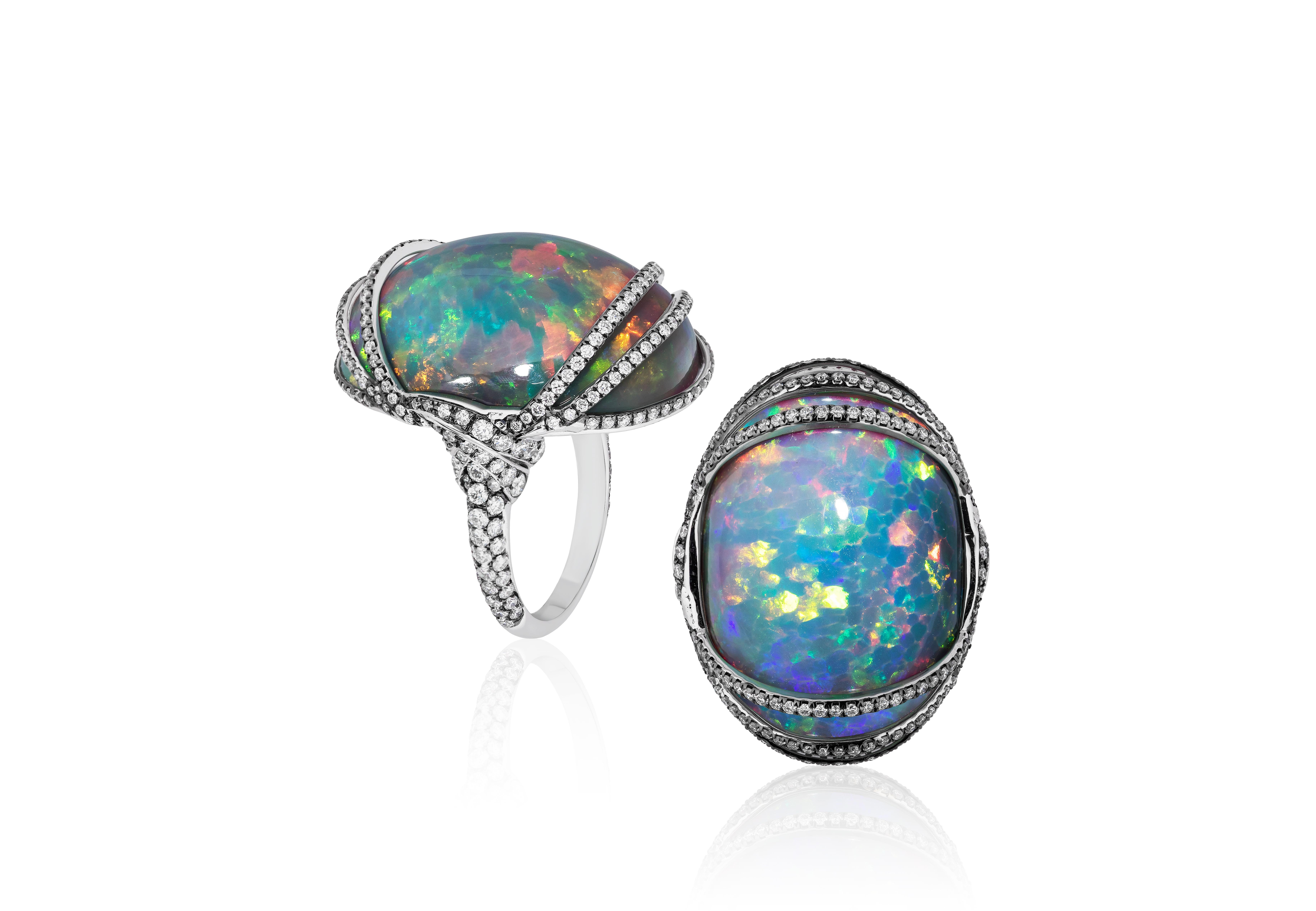 Magnificence and boldness are the best words to describe this one of a kind Large Black Opal Cabochon Diamond Ring with Light Black Rhodium in 18K White Gold, from 'G-One' Collection. It is definitely an outstanding piece of jewelry to have in your