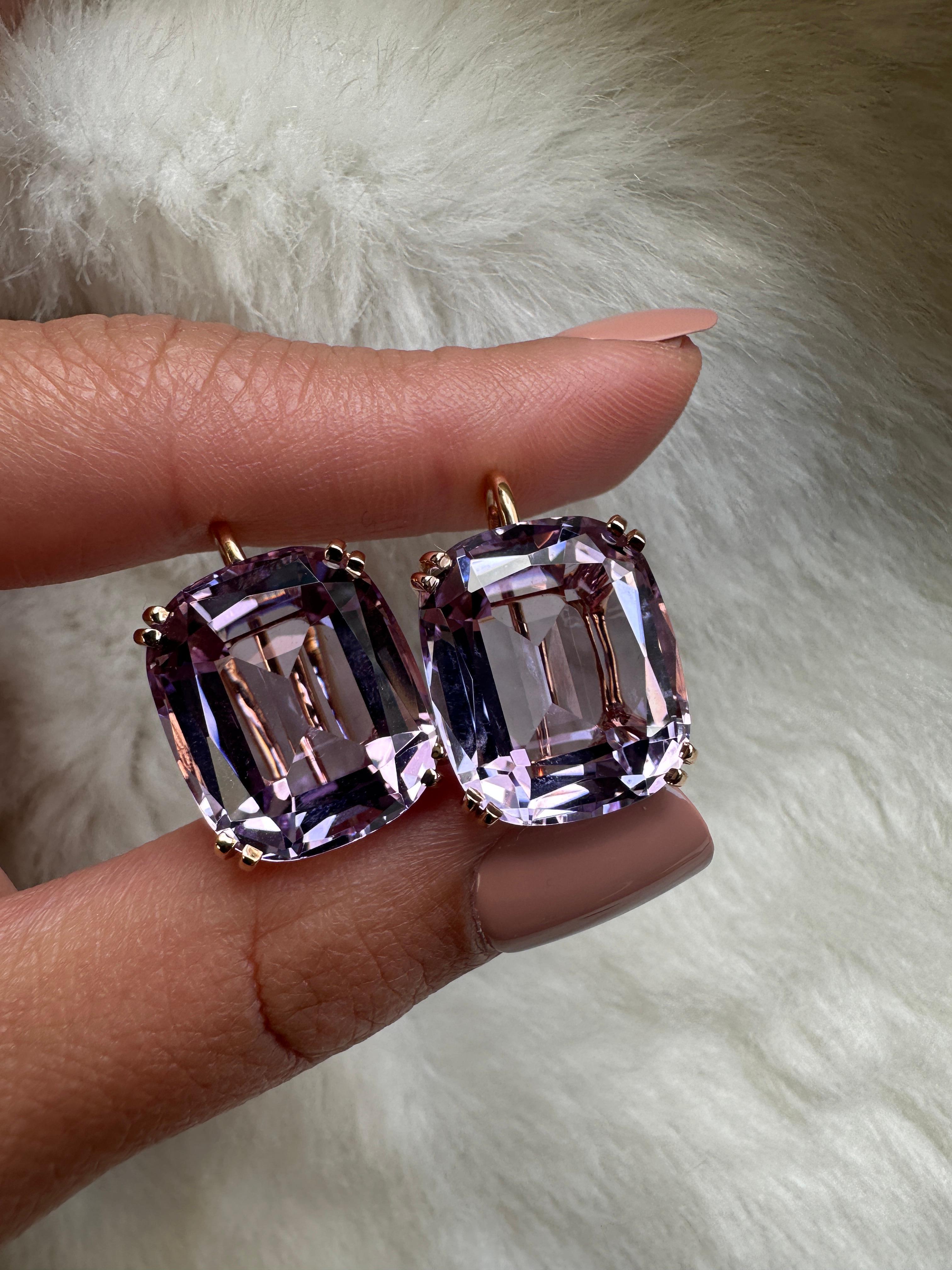 These Lavender Amethyst Cushion Earrings on Wire, are a distinct piece of our 'Gossip' Collection. These earrings are crafted with captivating lavender amethyst stones in a classic cushion-cut design. Delicately hanging from a wire, they present a