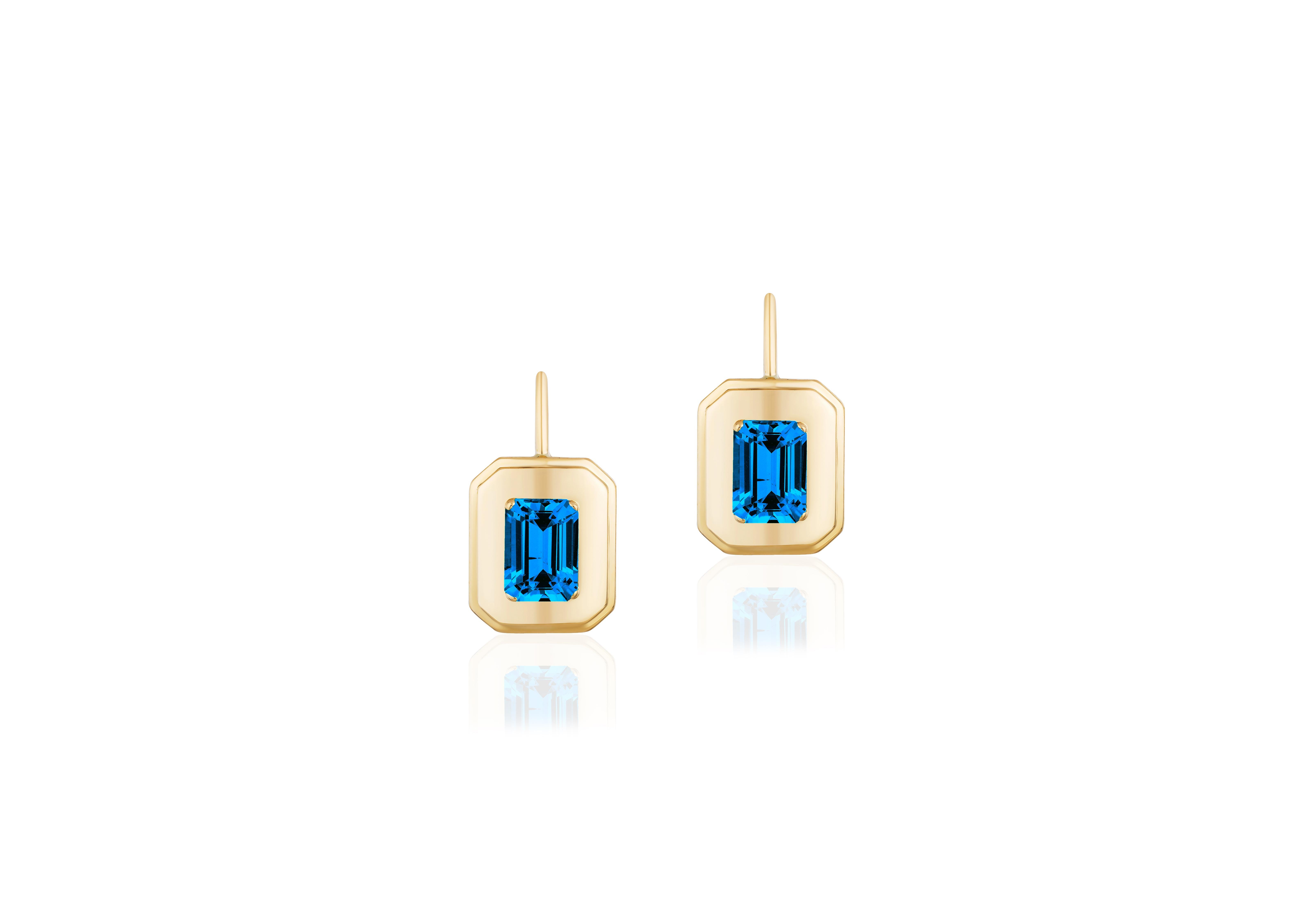 These unique earrings are a London Blue Topaz Emerald Cut, with Lever back. From our ‘Queen’ Collection, it was inspired by royalty, but with a modern twist. The combination of Gold, and London Blue Topaz represents power, richness and passion of a
