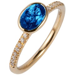 Goshwara London Anello con Topazio Blu Ovale e Diamante