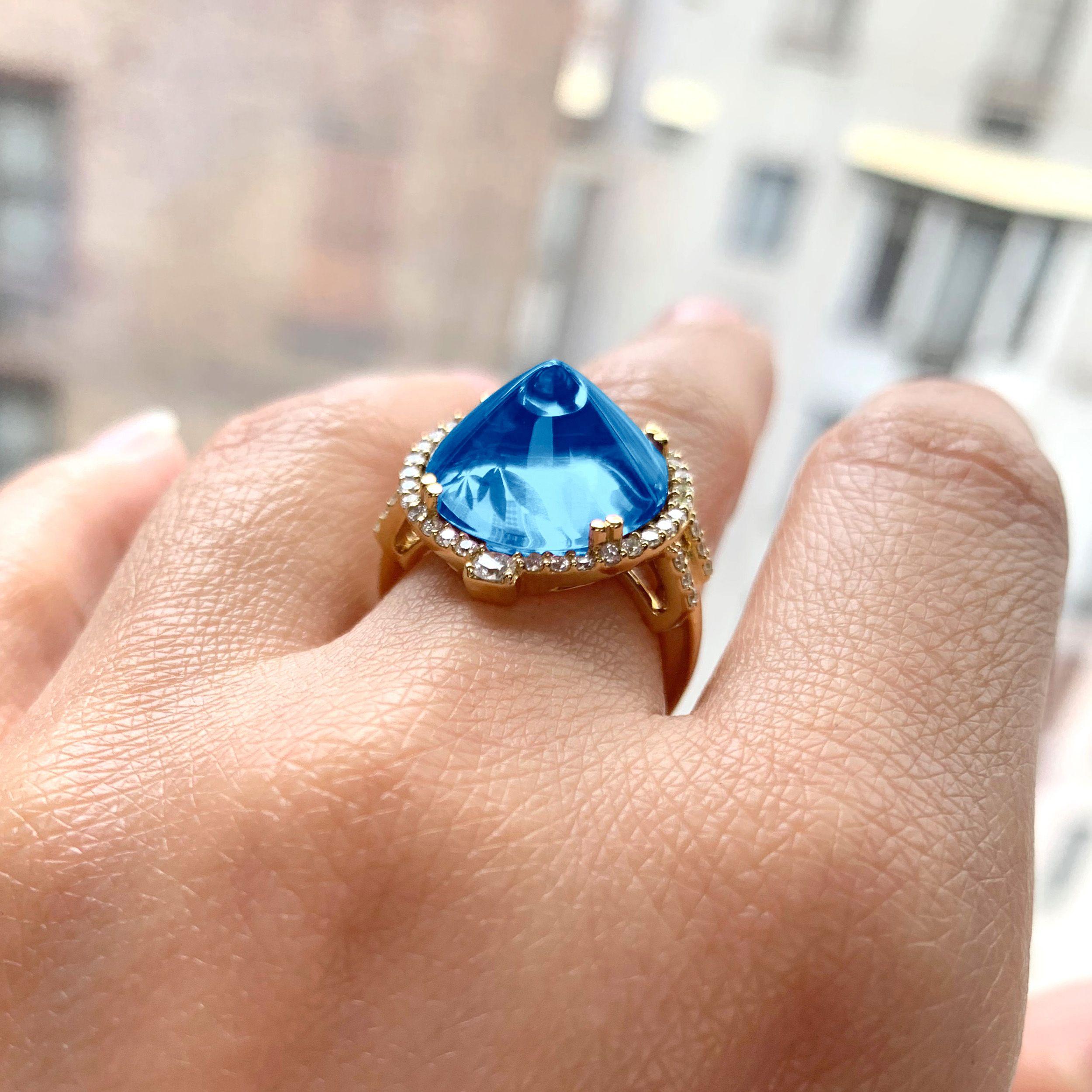 London Blue Topaz Sugar Loaf Ring with Diamonds in 18K Yellow Gold, from 'Rock 'N Roll' Collection.    Extensive collection of big and bold pieces. Like the music, this Rock ‘n Roll collection is electric in color and very stimulating to the eye.