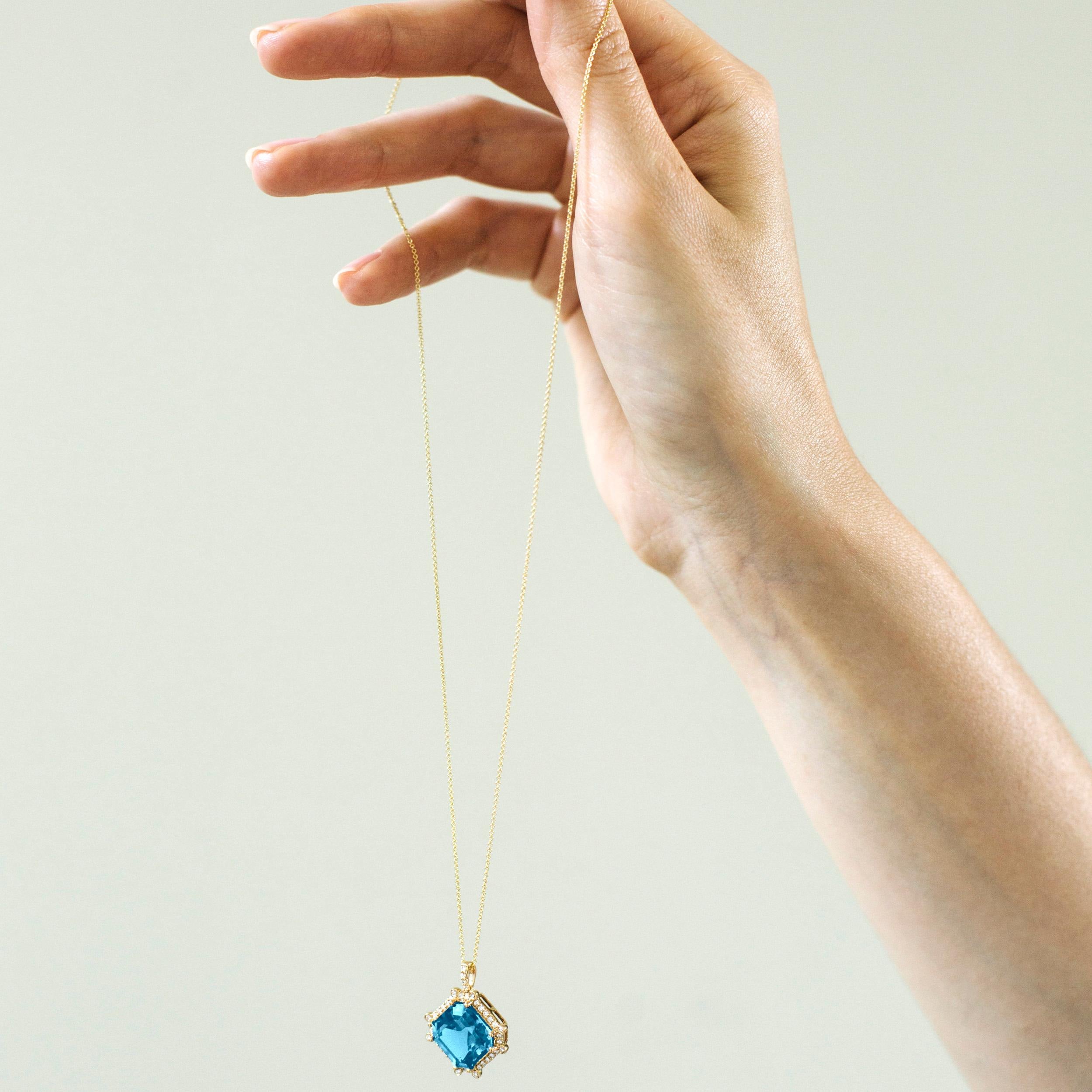Blue Topaz & Diamond Octagon Pendant in 18K Yellow Gold on an 18'' Chain from 'Gossip' Collection

Stone Size: 12 x 12 mm 

Gemstone Approx Wt: Blue Topaz-  9.10 Carats

Diamonds: G-H / VS, Approx Wt: 0.30 Carats