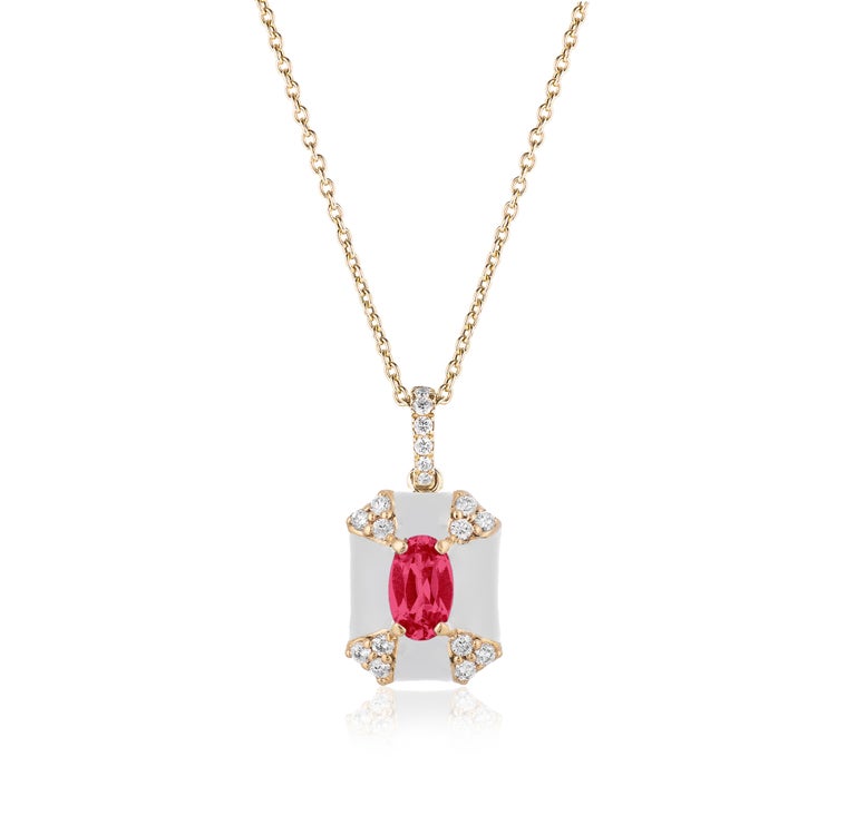 Octagon White Enamel Pendant with Ruby and Diamonds in 18K Yellow Gold. from ‘Queen’ Collection
Stone Size: 4 mm 
Diamonds: G-H / VS, Approx. Wt: 0.10 Carats