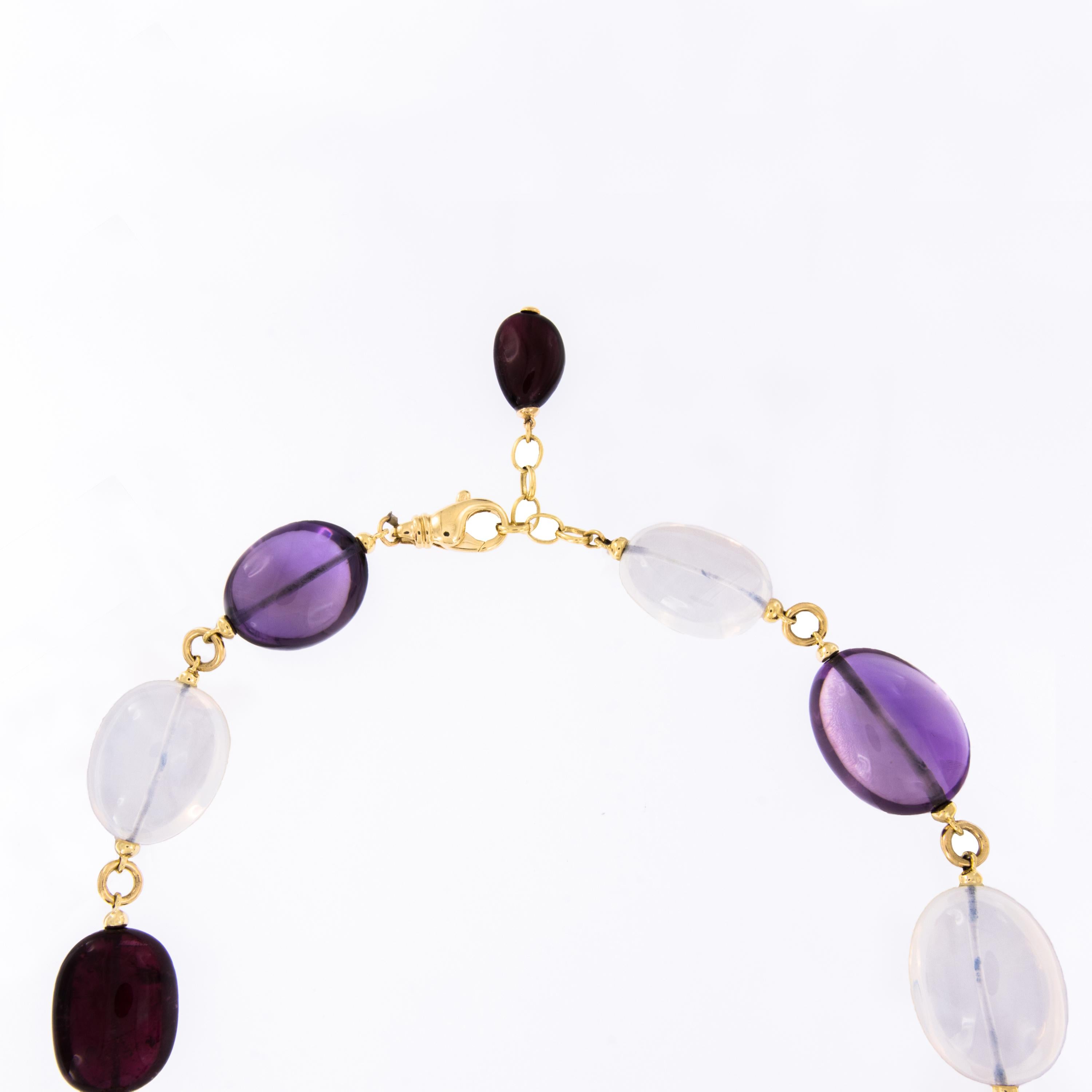 Goshwara, a term for perfect shape, is a company known for exceptional color gems and this 18 karat yellow gold Beyond beaded necklace features 252.38 Cttw. amethysts, 326.09 Cttw. moon quartz & 216.51 Cttw. rubelites. Go beyond expectations & Go