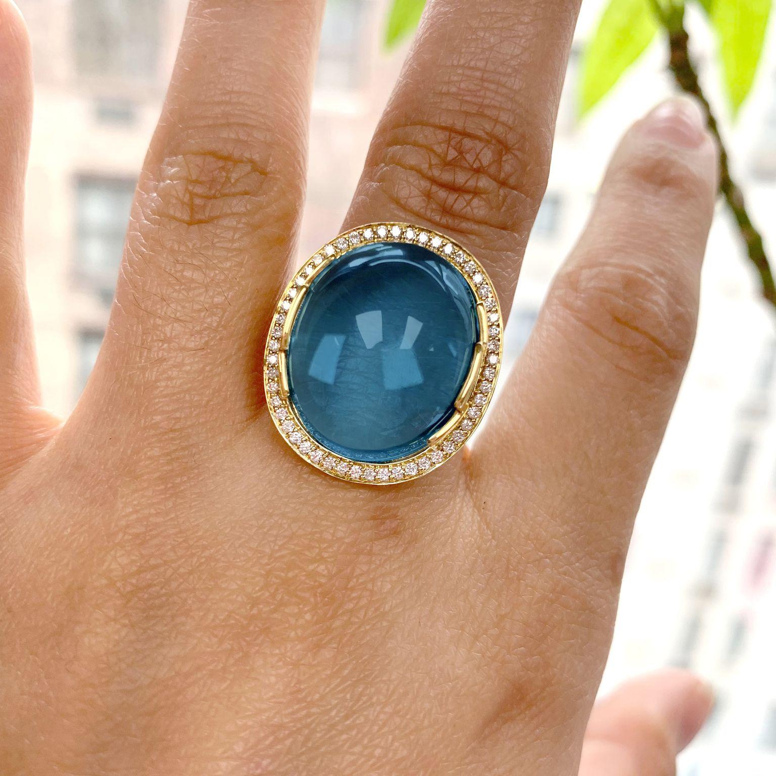 London Blue Topaz Oval Cabochon Ring with Diamonds in 18K Yellow Gold, from 'Rock 'N Roll' Collection. Extensive collection of big and bold pieces. Like the music, this Rock ‘n Roll collection is electric in color and very stimulating to the eye.