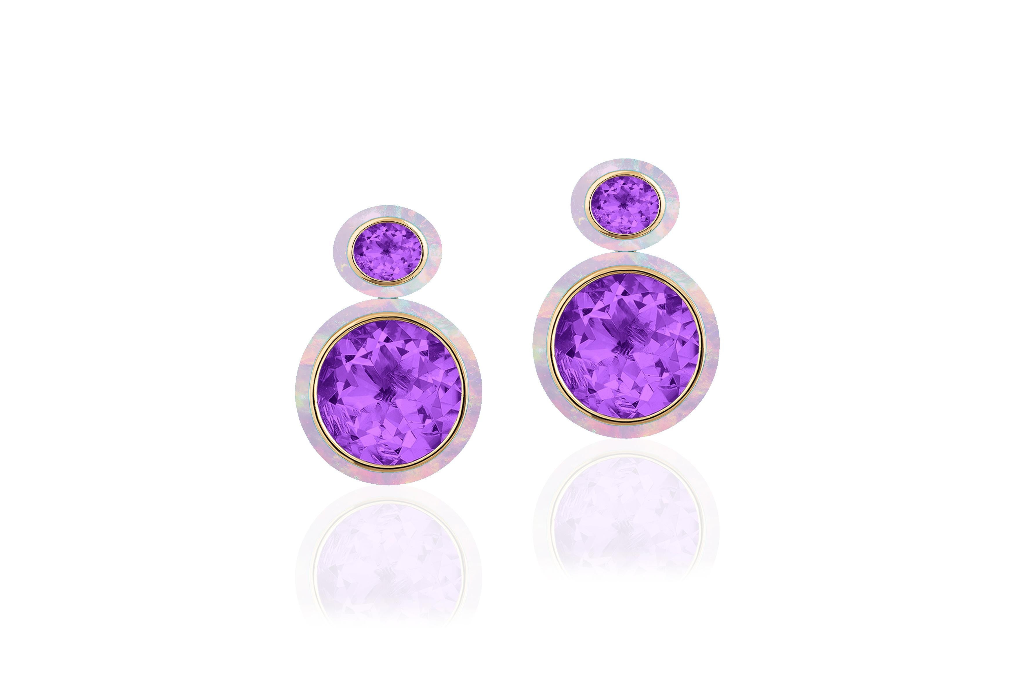 These Oval Shape Amethyst and Pink Opal Earrings in 18K Yellow Gold from the 'Melange' Collection are a stunning piece of jewelry. The earrings feature two oval-shaped Amethyst gemstones with a Pink Opal Border- set in a rich 18K yellow gold