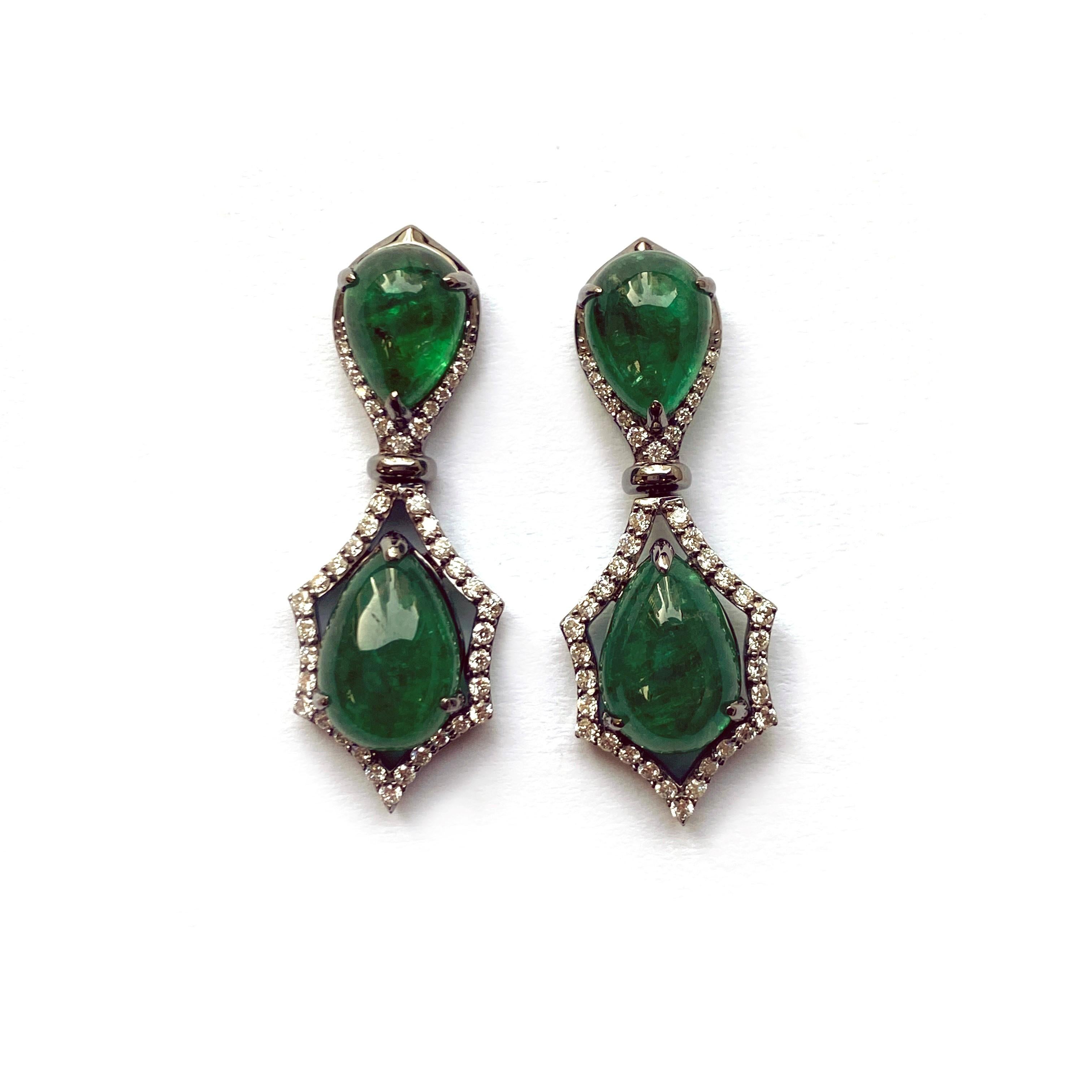 ‘Limited-Edition’ Pear Cab Emerald Earrings with Diamonds in 18K White Gold. The Emeralds makes these earrings very special, and a great piece to have in your personal collection.

* Gemstone: 100% Earth Mined 
* Approx. gemstone Weight: 13.00