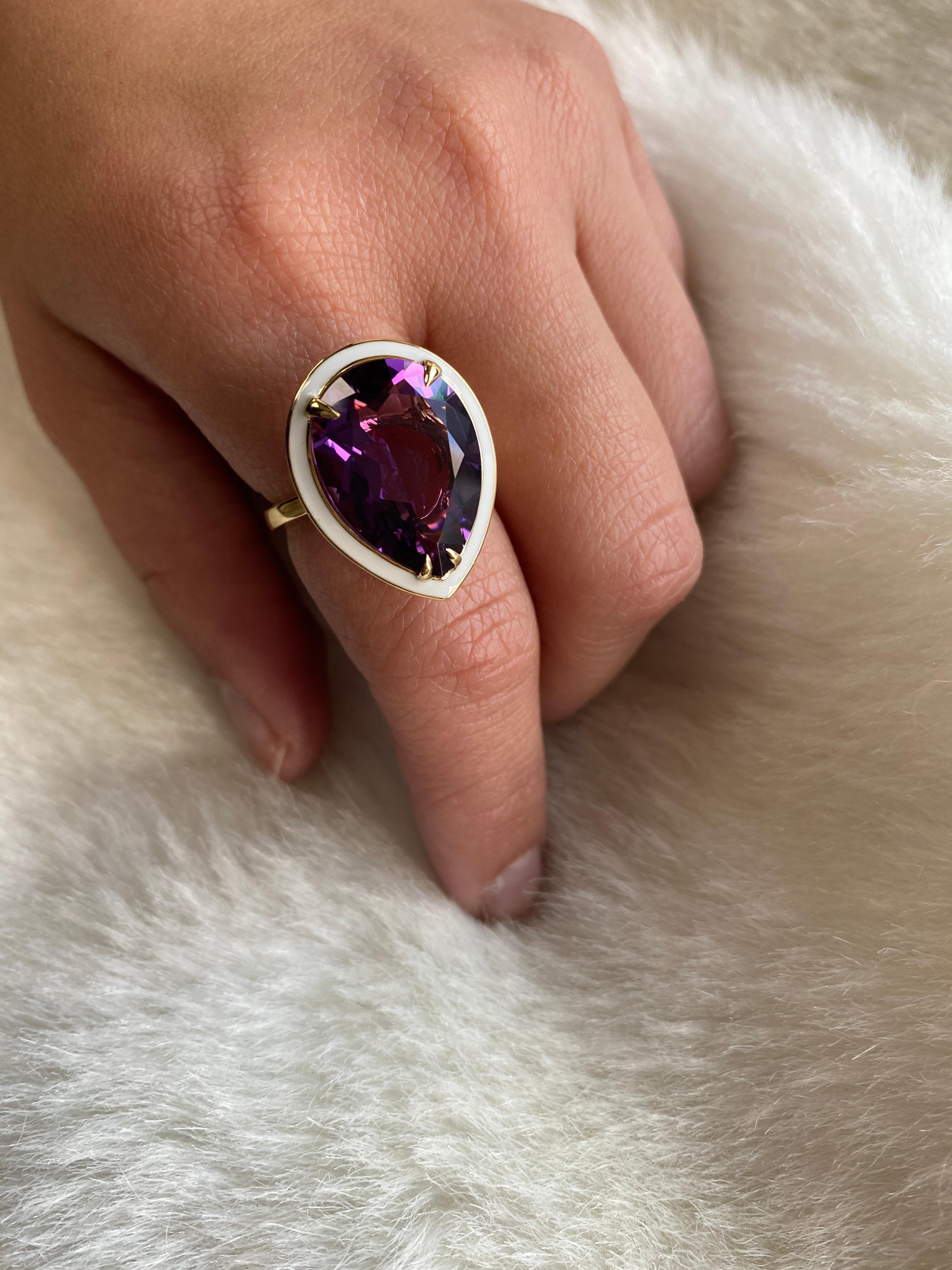 Pear Shape Amethyst  Ring With White Enamel  in 18K Yellow Gold, from 'G-One' Collection. The combination of enamel and Amethyst makes this ring very unique and a wonderful piece to add to your personal collection.

* Gemstone size: 18 x 13 mm
*