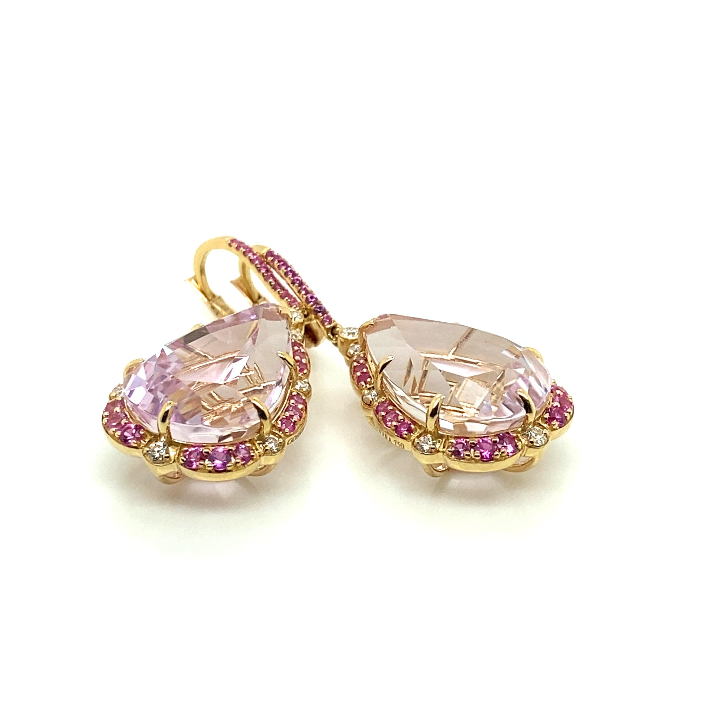 Pear shape Kunzite with Diamonds and Pink Sapphire Earrings in 18K Yellow Gold, from 'G-One' Collection

Stone Size: 18.5 x 12.5 mm 

Approx. Gemstone Weight: 26.99 Carats (Kunzite)

Diamonds: G-H / VS, Approx. Wt: 0.24 Carats