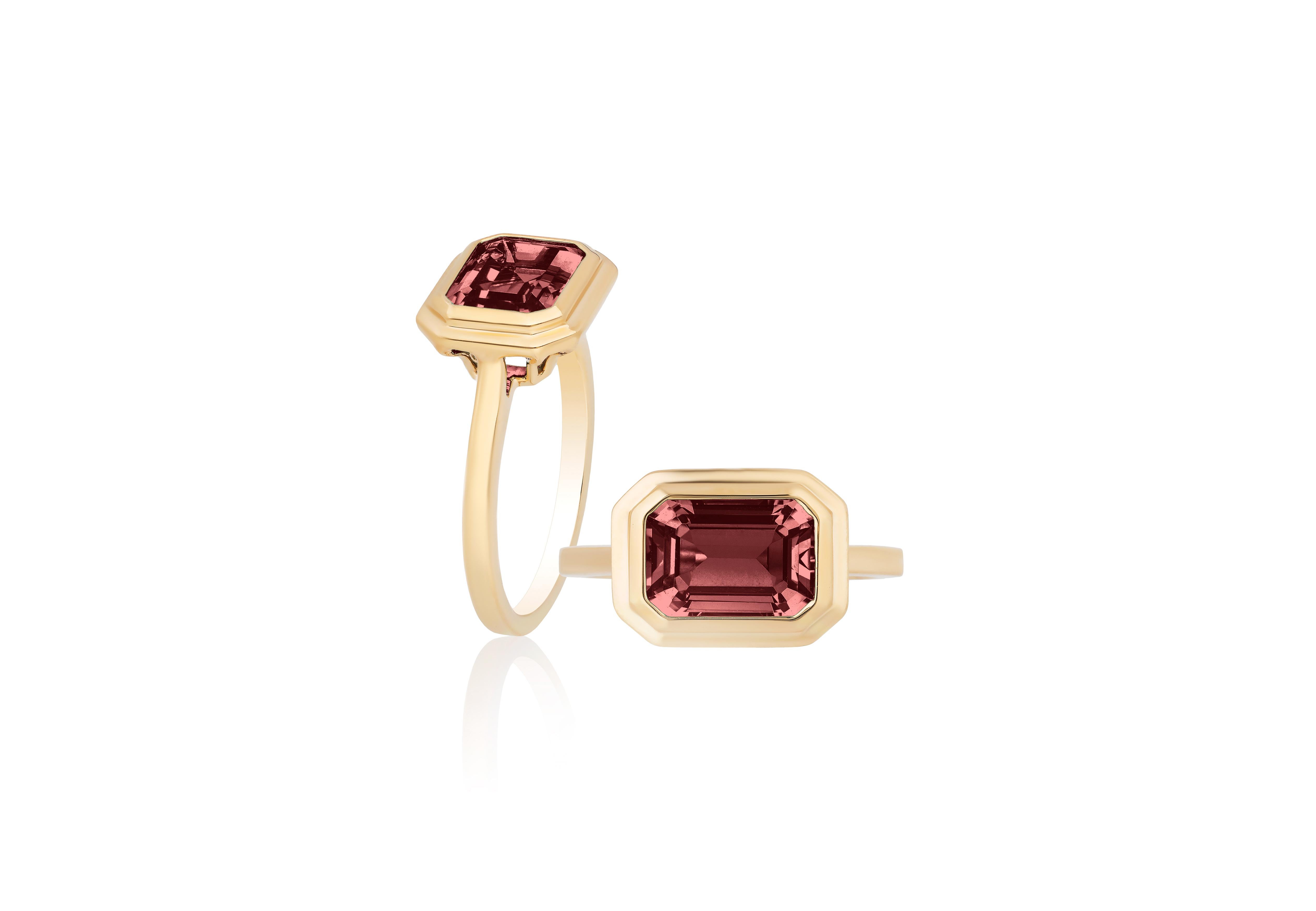 The Pink Tourmaline Horizontal Emerald Cut Ring is a breathtaking piece of jewelry from the 