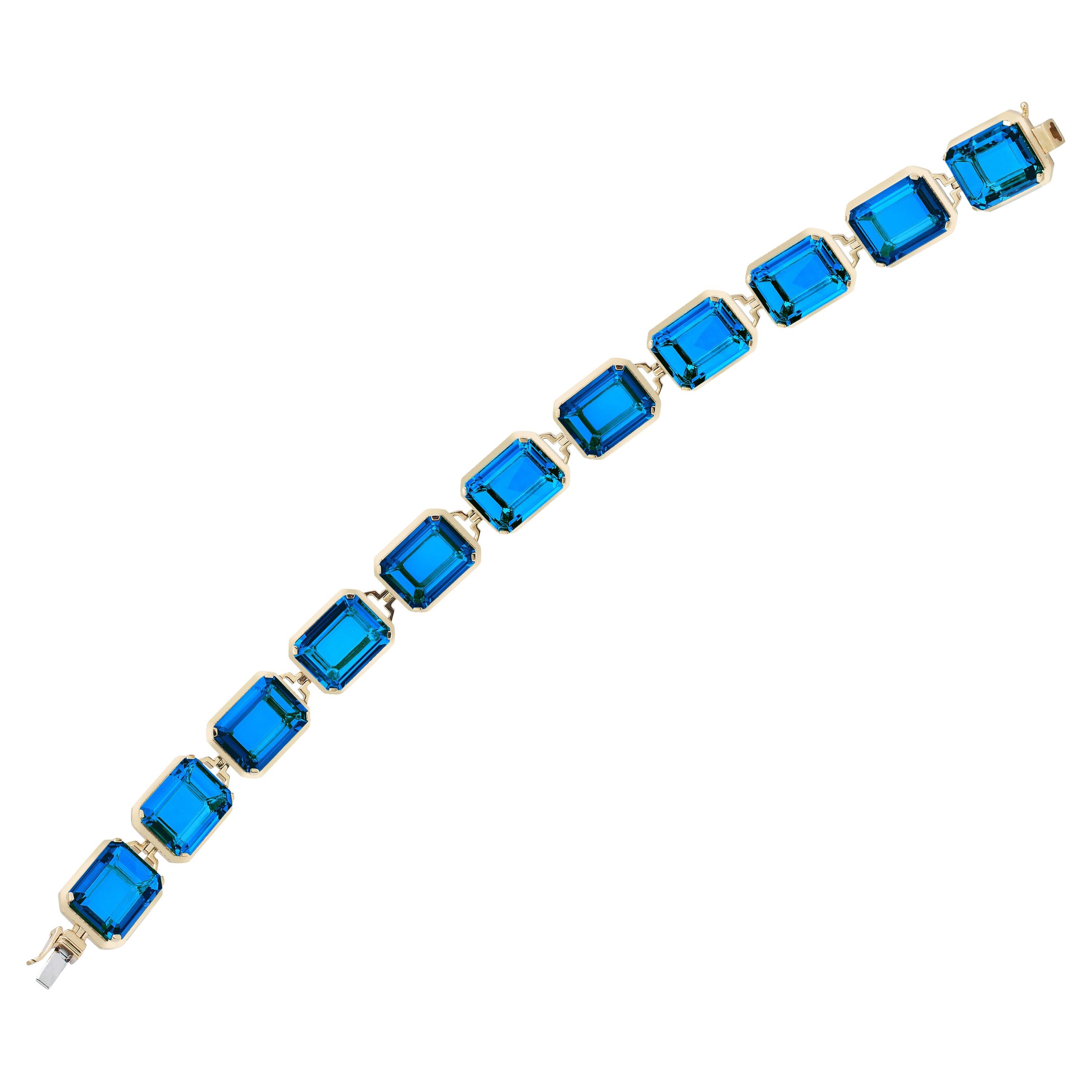 Goshwara Plain Gold London Blue Topaz Emerald Cut Bracelet For Sale