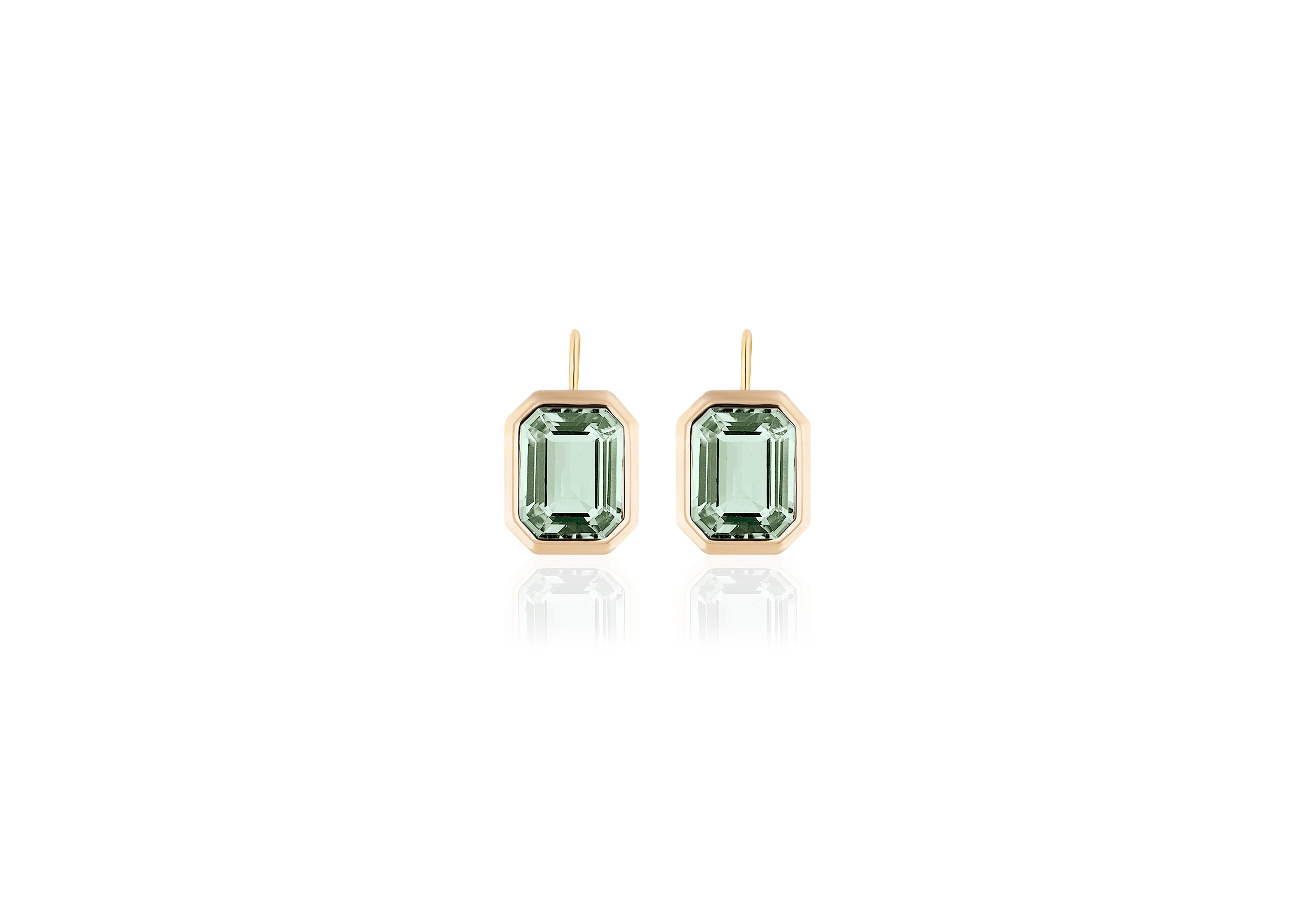 These Prasiolite Emerald Cut Bezel Set Earrings on Wire in 18K Yellow Gold from the 'Manhattan Collection are a stunning and sophisticated jewelry piece. These earrings feature exquisite Prasiolite gemstones with an elegant emerald cut, cradled in a