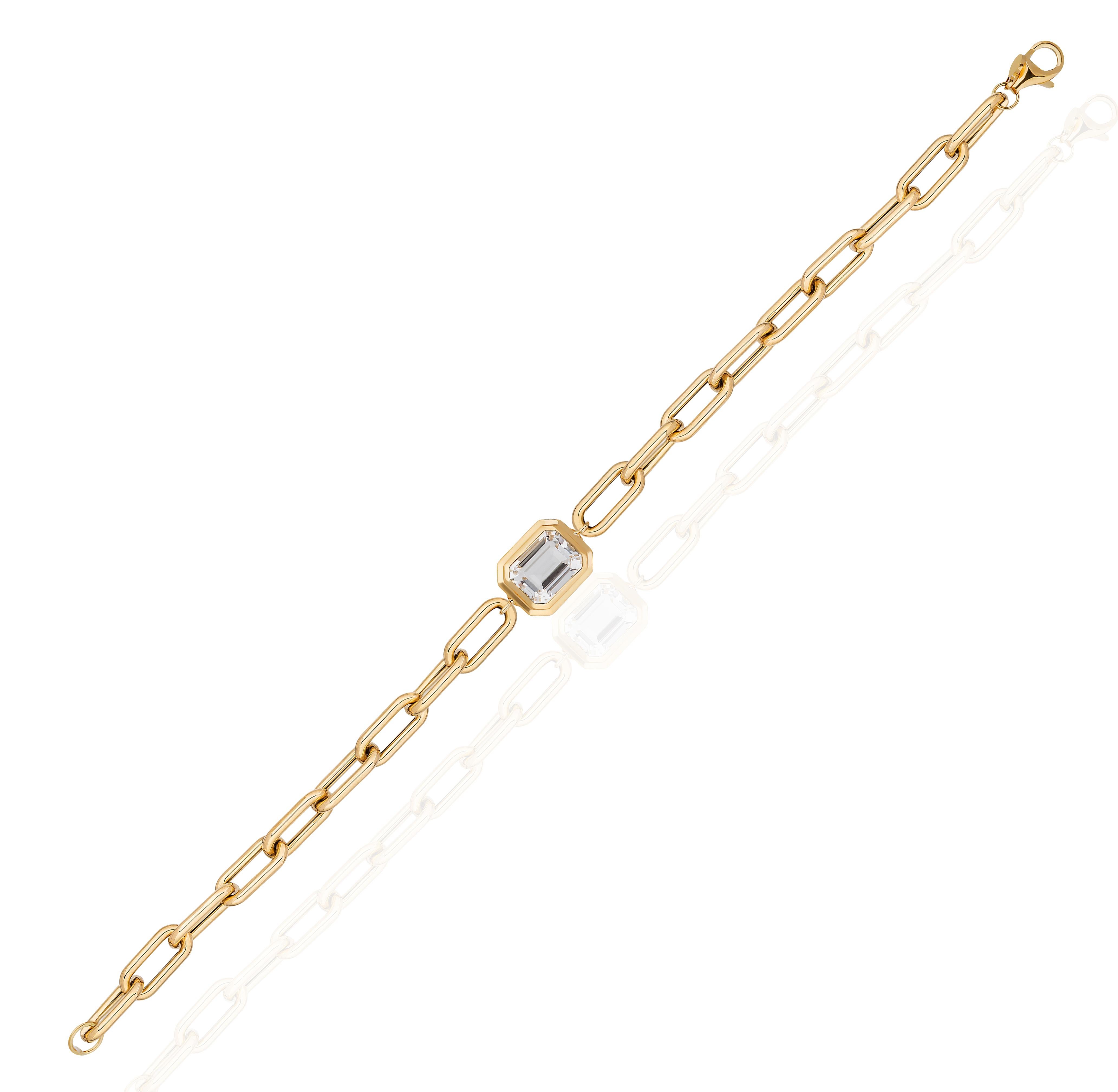 Elevate your style with the Rock Crystal Emerald Cut Bezel Set Bracelet in 18K Yellow Gold from our captivating 'Manhattan' Collection. Merging minimalist elegance with confident design, this bracelet captures the essence of New York City's iconic