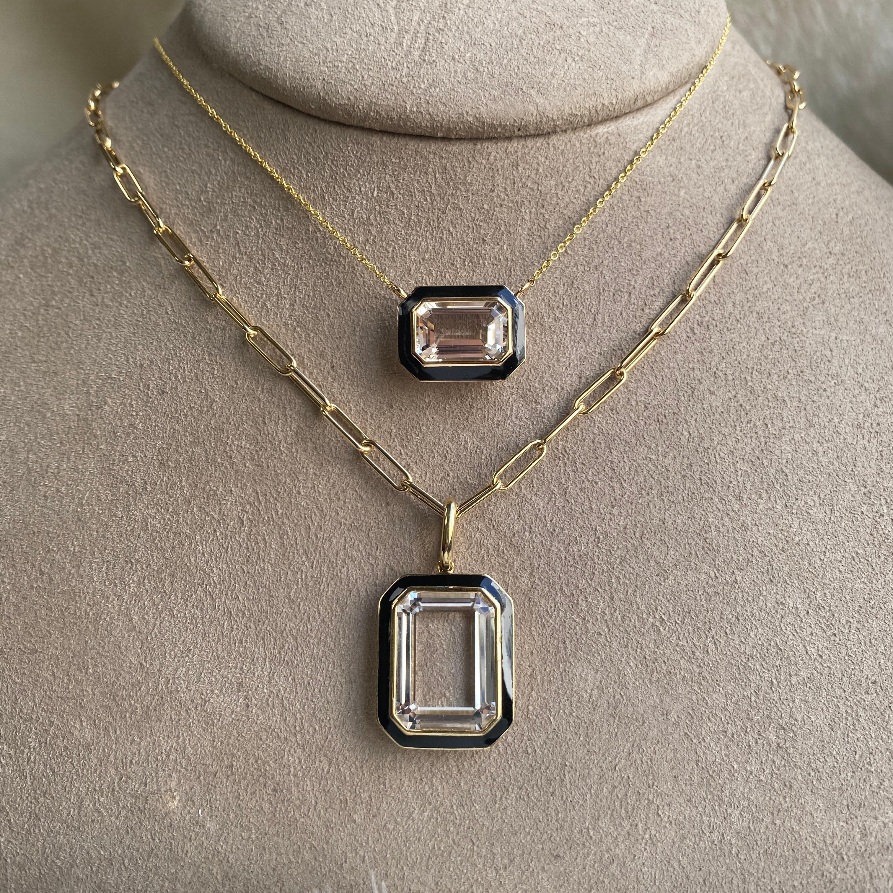 Part of our very new ‘Queen’ Collection, this classic and elegant pendant makes a bold statement and is great for day or night time.

Is a Rock Crystal Emerald Cut East-West Pendant with Black Enamel in the borders.

Our Queen Collection was