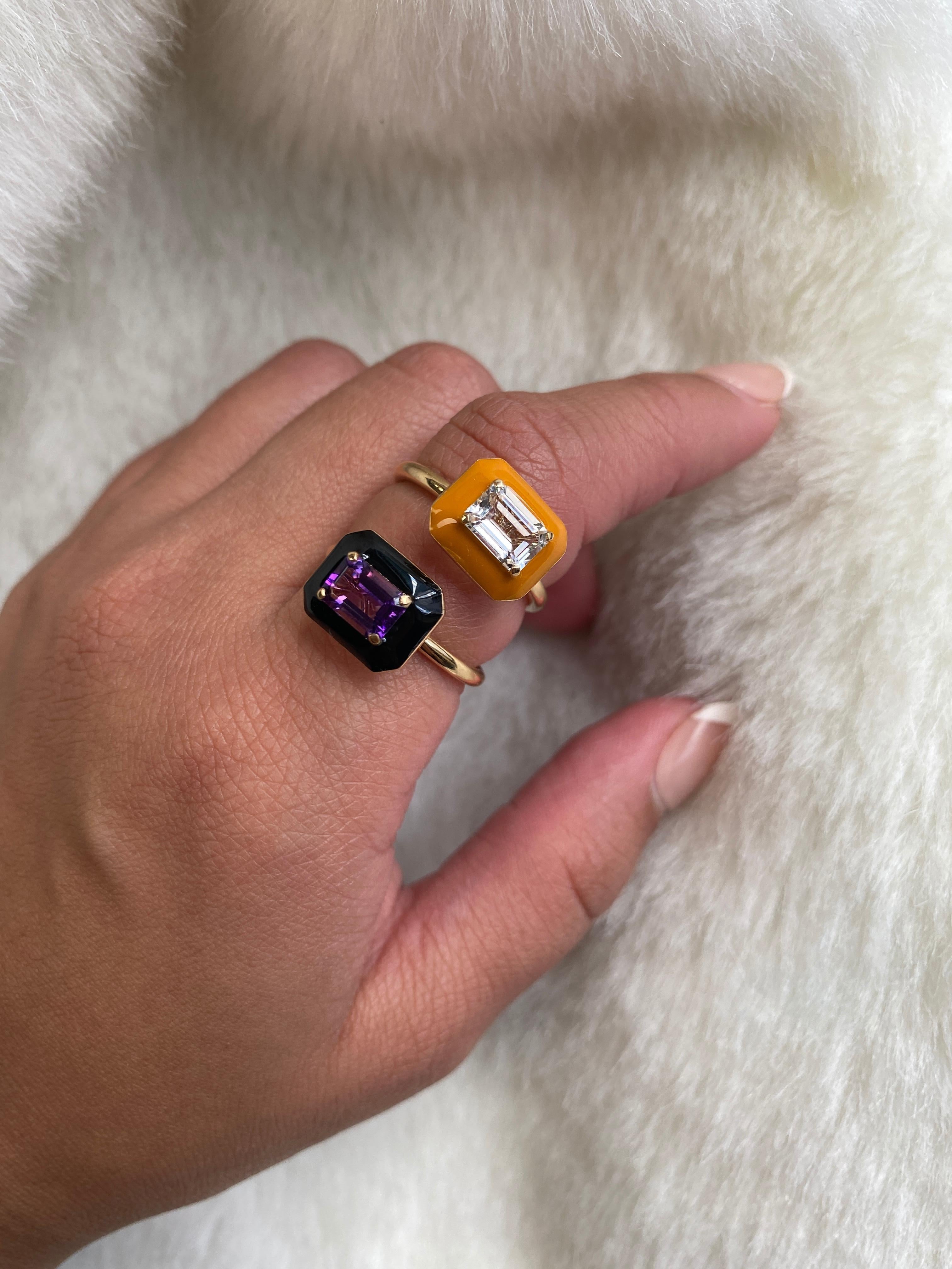 This is an outstanding Rock Crystal Emerald Cut East-West Ring with Brown Enamel, set in 18K Yellow Gold. From our ‘Queen’ Collection, it was inspired by royalty, but with a modern twist. The combination of enamel, and Rock Crystal represents power,