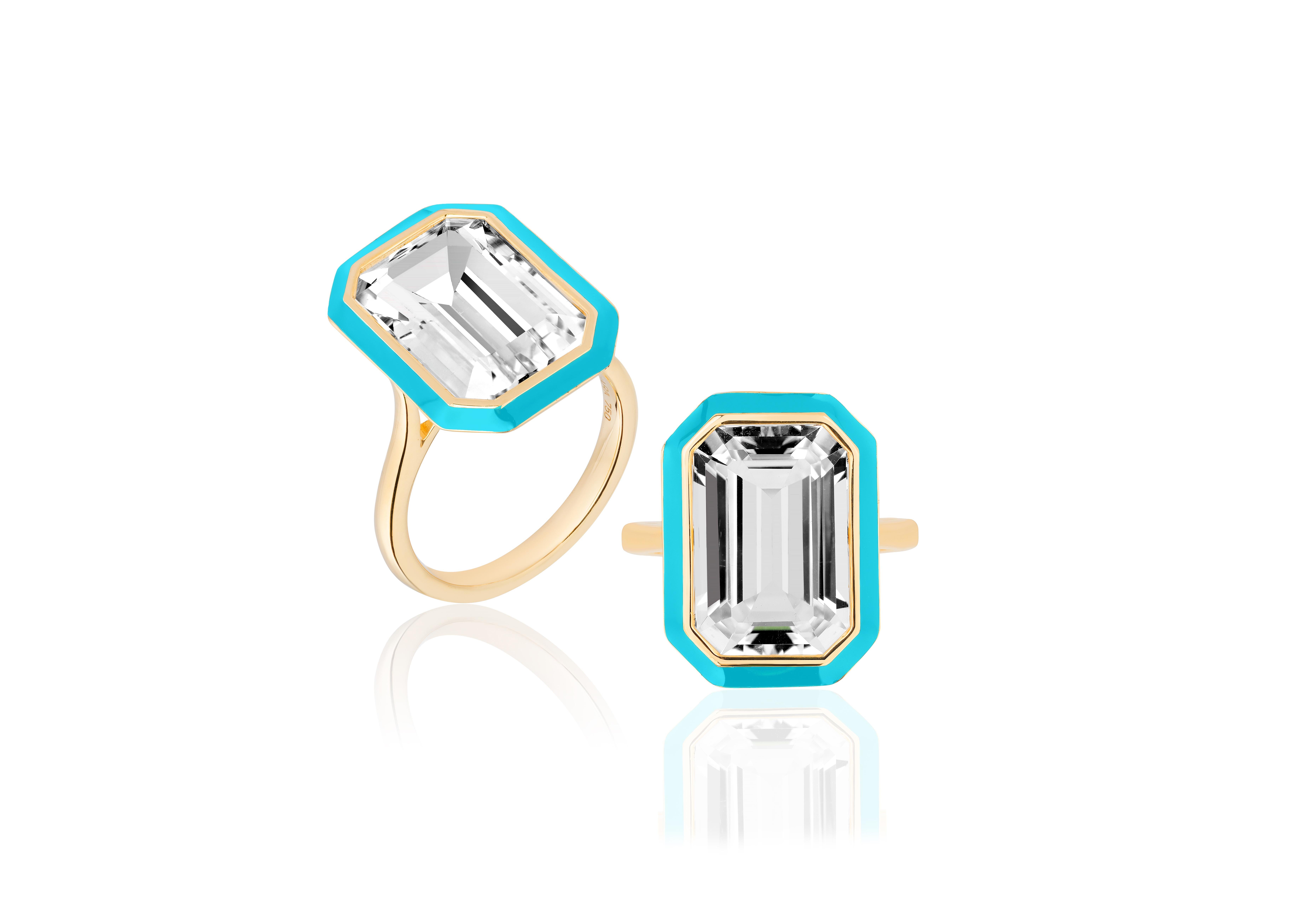 This is a unique combination of Rock Crystal and Turquoise enamel. If you want to make a statement this is the perfect ring to do it!

A 10 x 15 mm Rock Crystal Emerald cut ring in a bezel setting, with Turquoise enamel in the borders.

Gemstone: