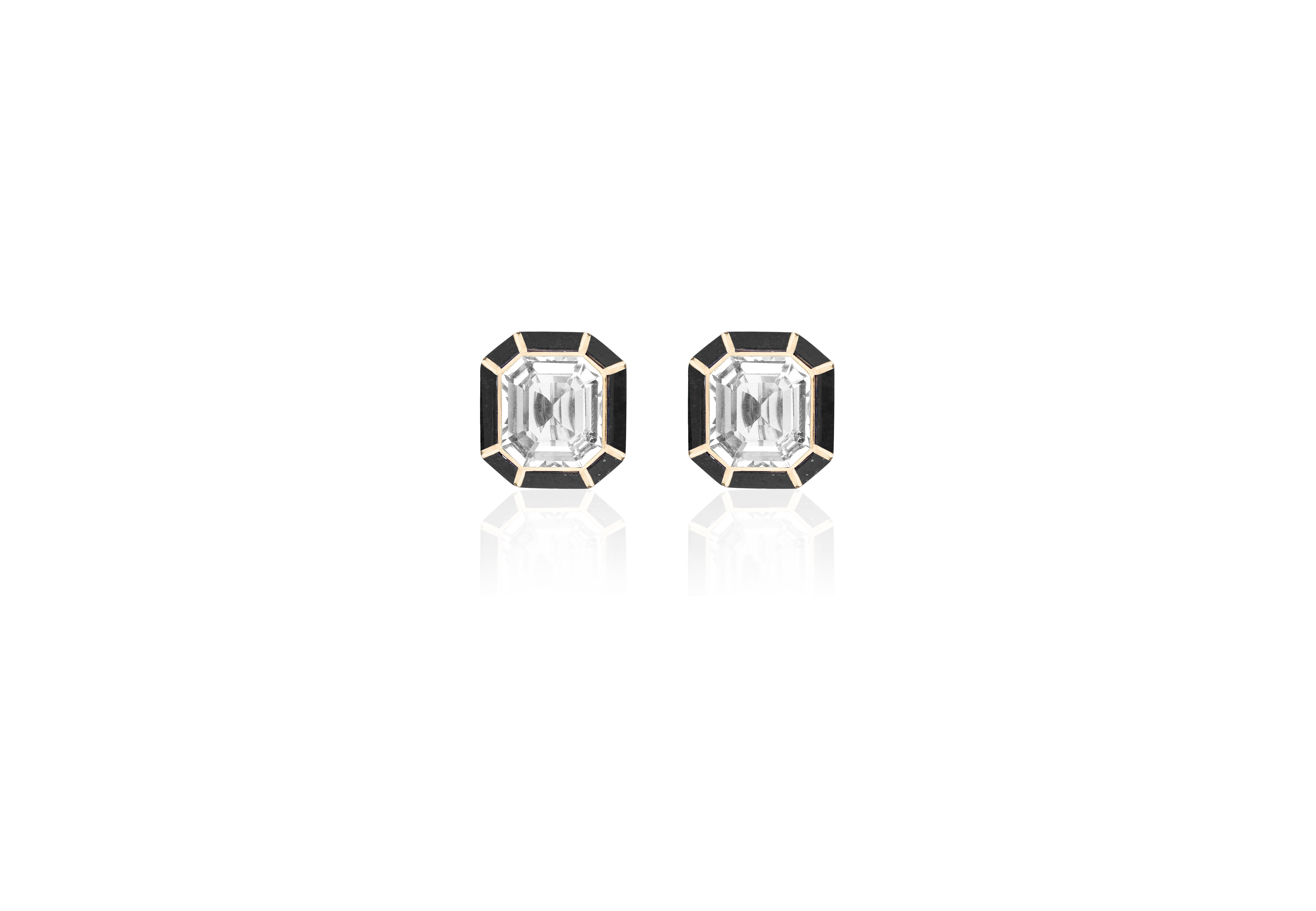 The Rock Crystal & Onyx Stud Earrings from the 'Melange' Collection showcase a captivating blend of elegance and charm. Crafted with exquisite attention to detail, these earrings feature stunning emerald cut Rock Crystal and Onyx gemstones set in