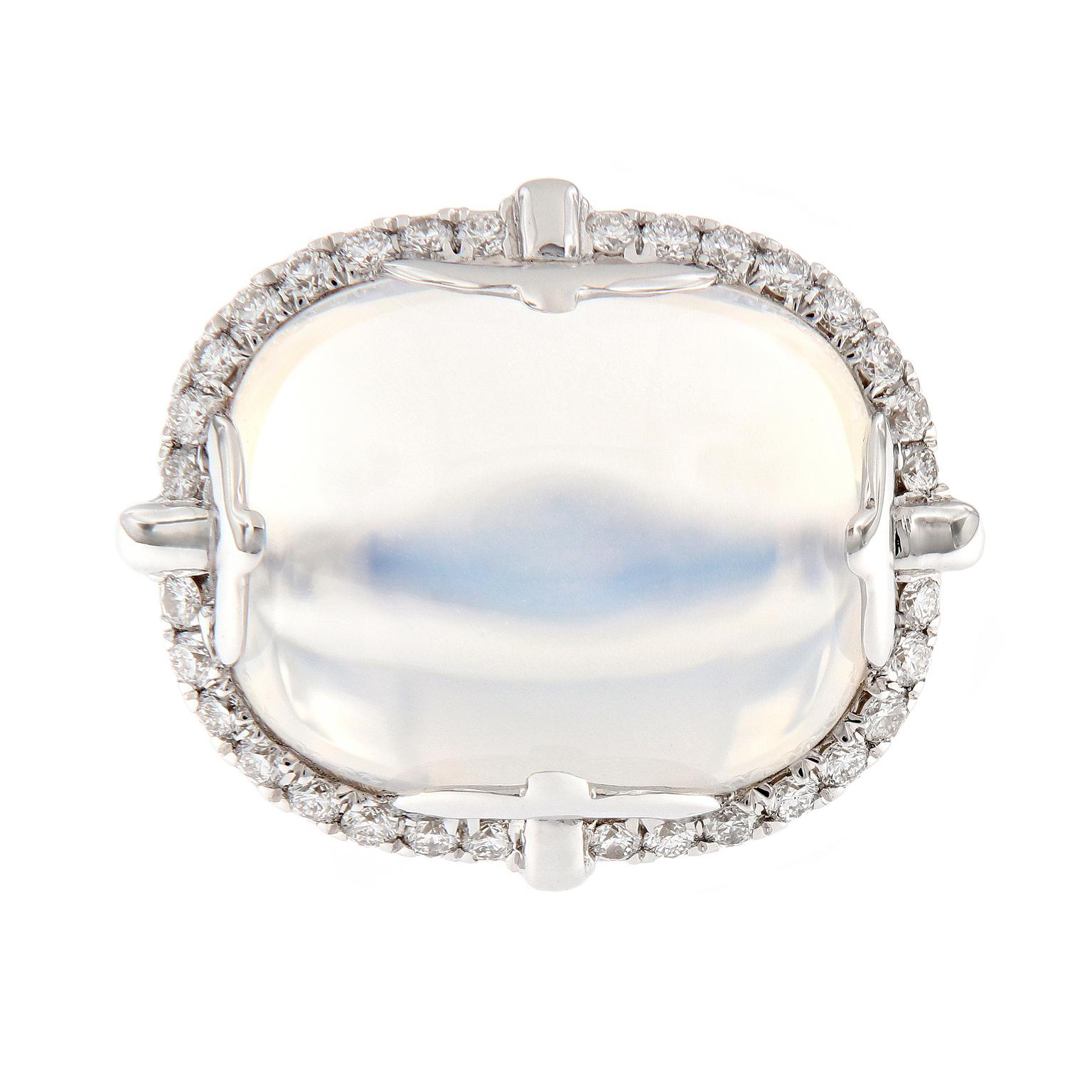 Be the Rock Star that you are wearing this ring! Like the music, the Rock ‘n Roll collection is electric in color with silhouettes that may bring out the rock star in you! This ring centers around a 13.59 carat cabochon moon quartz and is surrounded