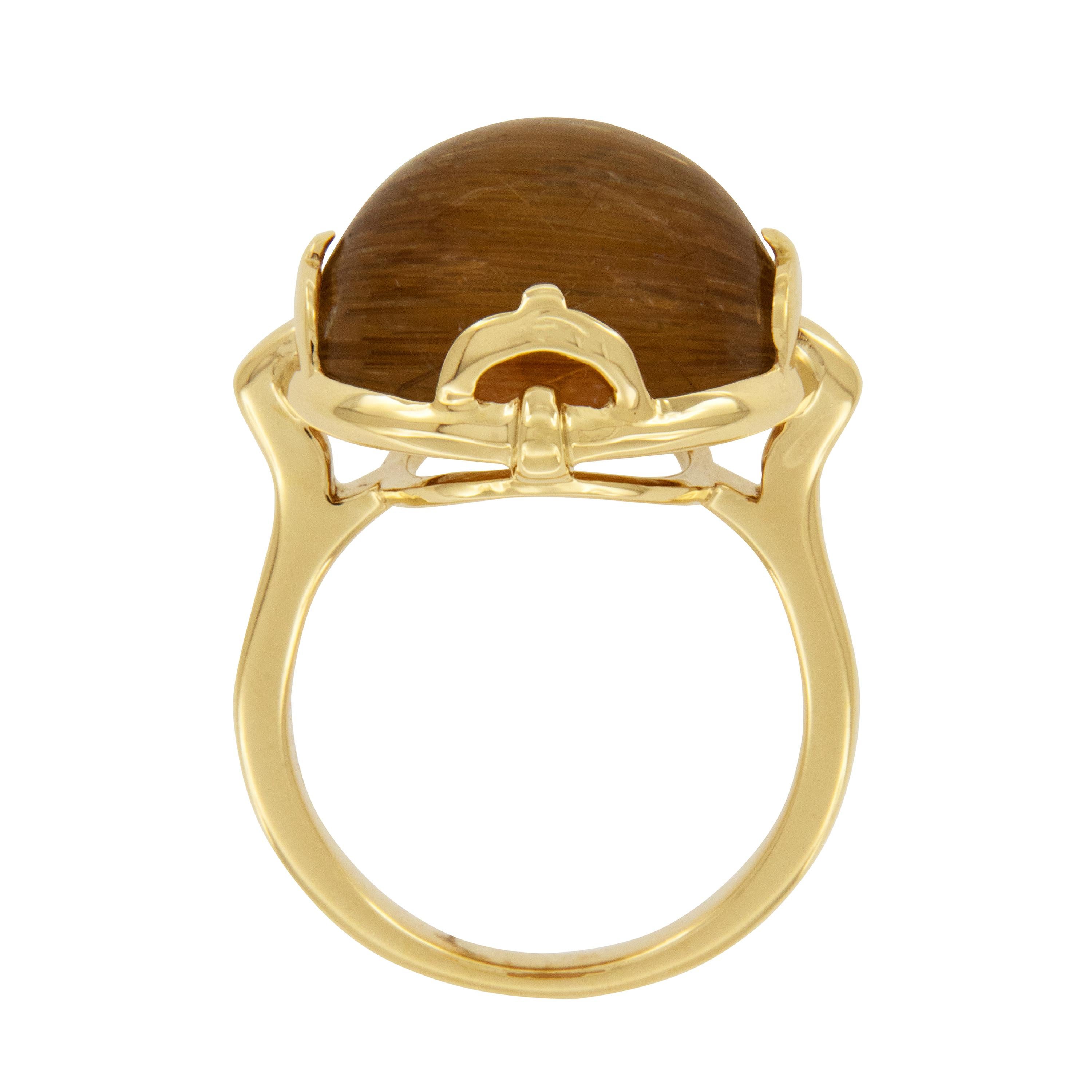 Be the Rock Star that you are wearing this ring! Like the music, the Rock ‘n Roll collection is electric in color with silhouettes that may bring out the rock star in you! This ring centers around a glimmering 17.67 carat cabochon golden rutilated