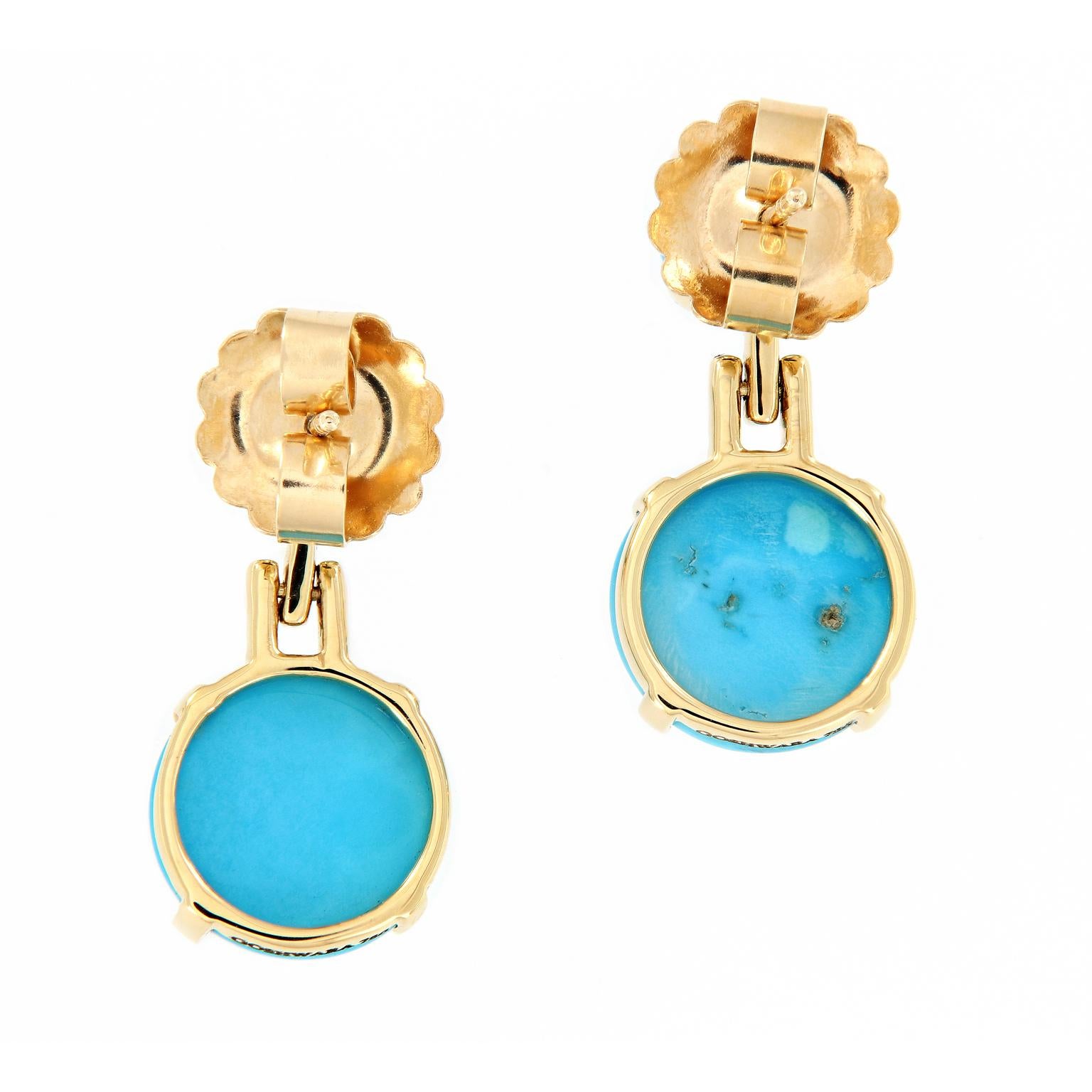 Exquisite drop earrings feature stunning round cabochon turquoise and diamonds in 18k yellow gold. Earrings are from the Rock-N-Roll Collection designed by Goshwara. Weigh 7.4 grams. 25mm long. Marked Goshwara.

Turquoise 13.10 cttw
Diamond 0.11 cttw