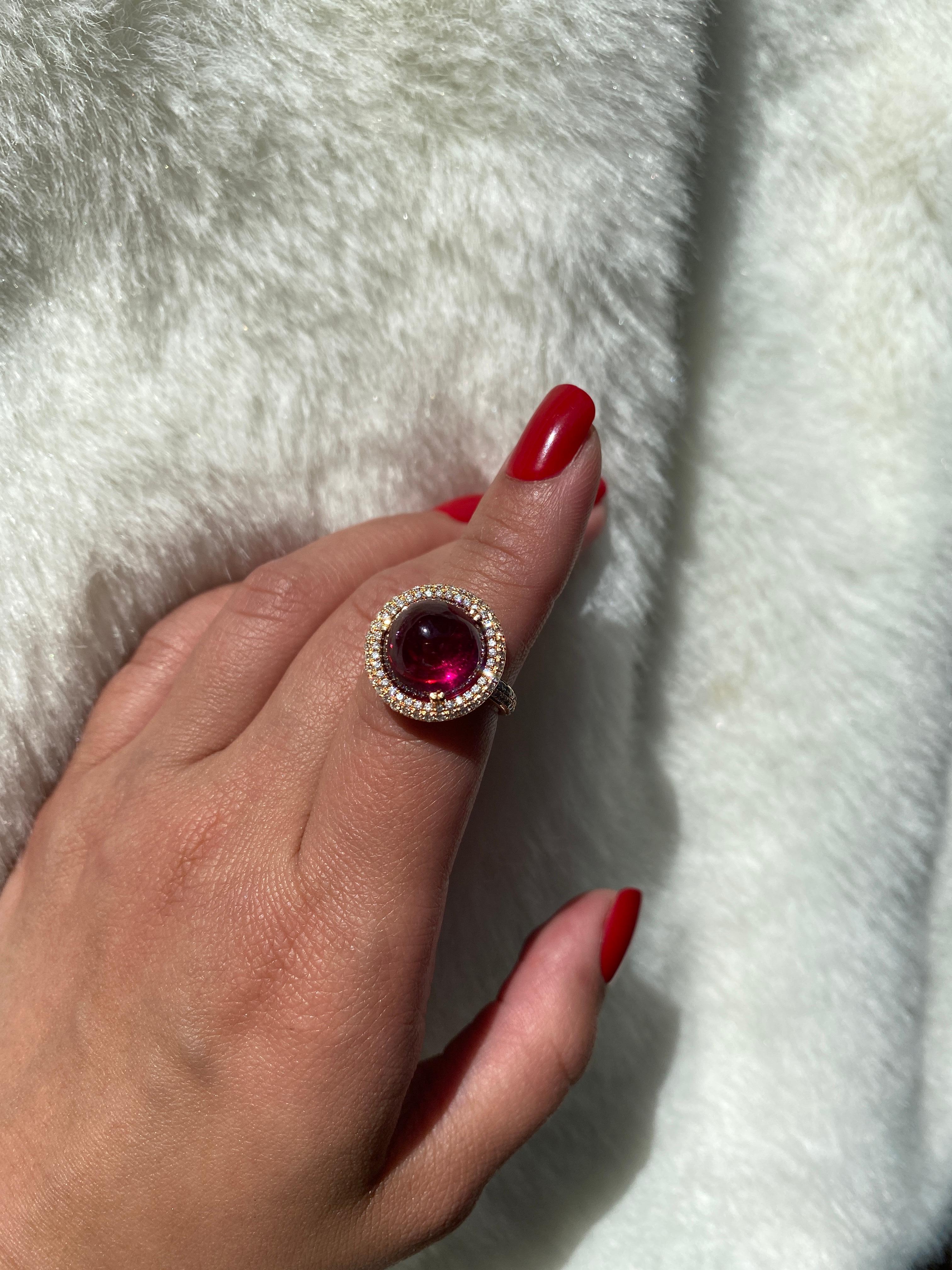 This very special and fine Rubelite Round Cabochon Ring in 18K Rose gold with diamonds is from 'G-One' Collection. This ring is perfect for an everyday look and can be carried to a night out.

* Gemstone size: 11.8 mm
* Gemstone: 100% Earth Mined 
*