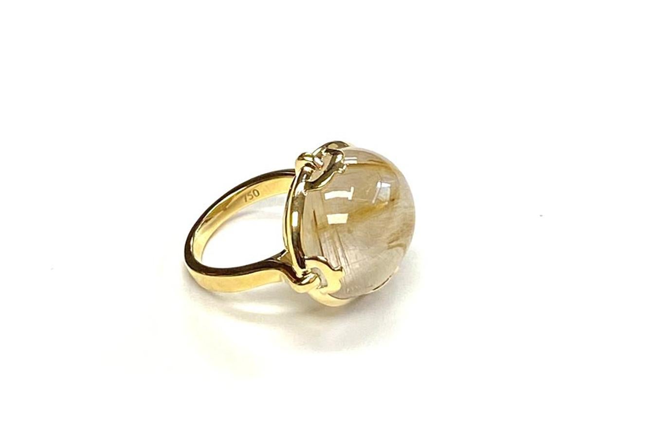 Rutilated Oval Cabochon Ring in 18K Yellow Gold, 'Limited-Edition'. Please allow 3-4 weeks for this item to be delivered. (The size of the ring can be adapted as per request)

Stone Size: 20 x 17 mm

Approx. Stone Wt: Wts: 24.61 Carats (Rutilated)