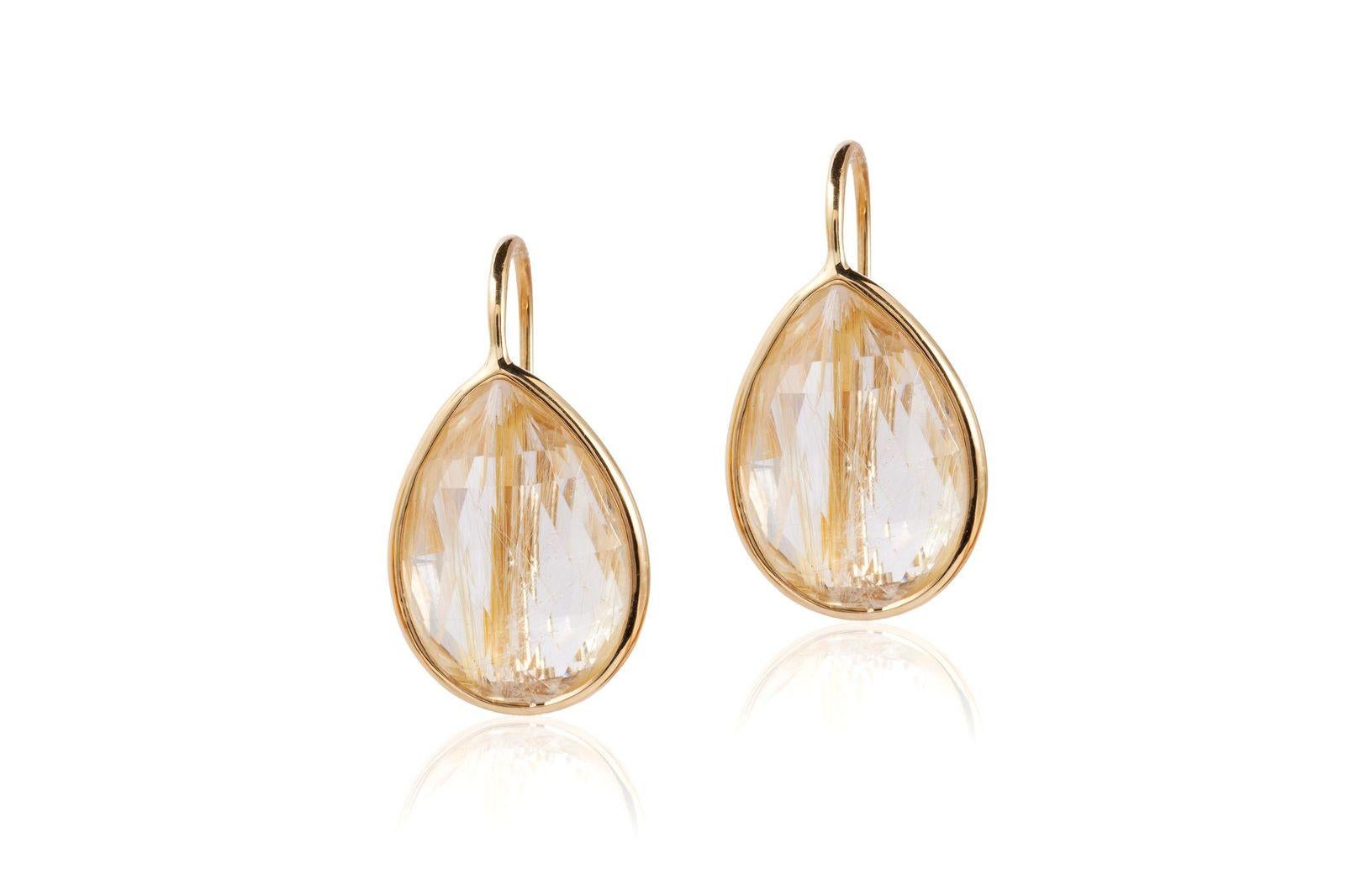 Rutilated Pear Shape Briolette Earrings on Wire in 18K Yellow Gold, from 'Gossip' Collection

Stone Size: 10 x 14 mm 

Gemstone Approx Wt: Rutilated - 10.64 Carats