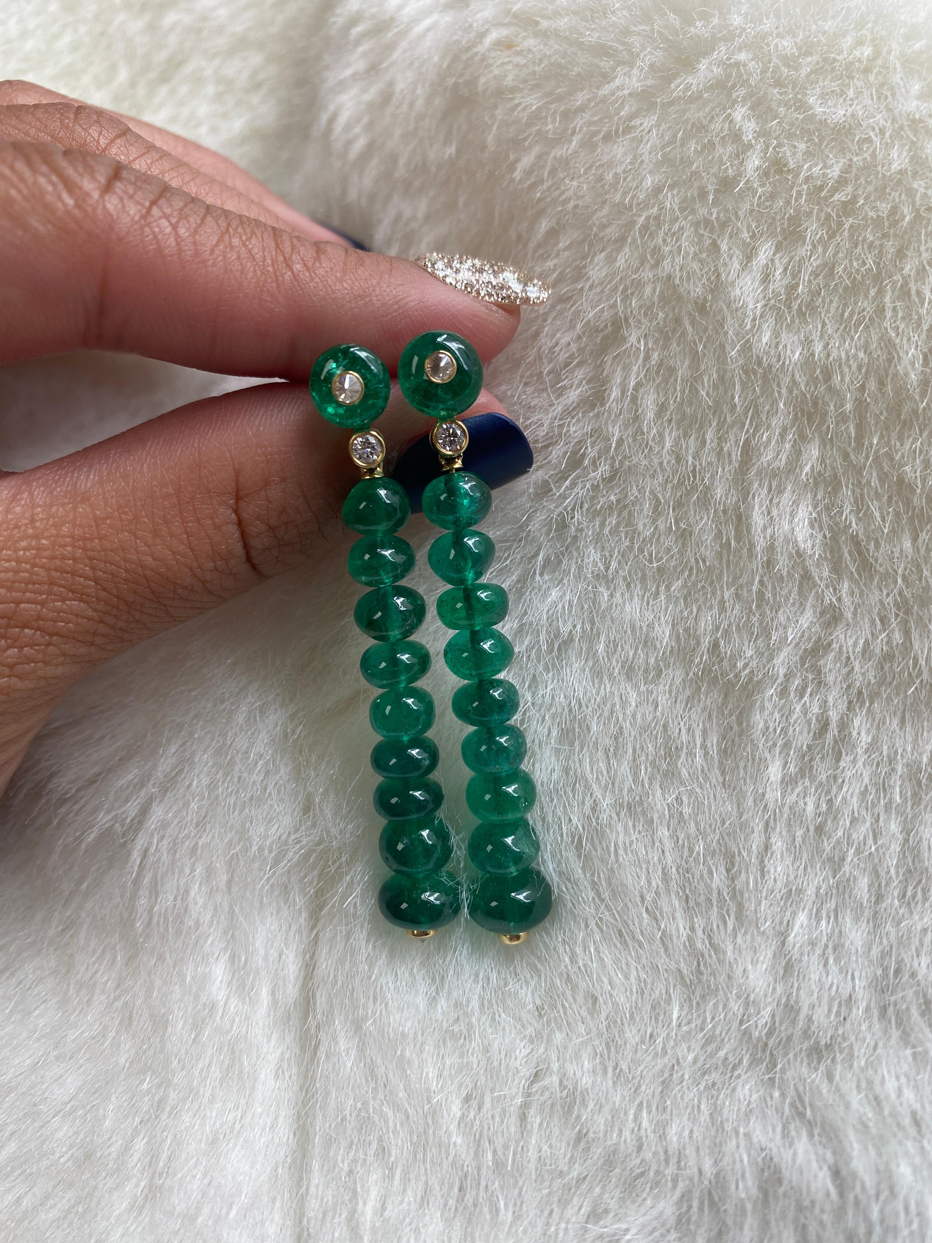 Single Line Emerald Bead Long Earrings with Diamonds in 18K Yellow Gold, from ‘G-One’ Collection. These emerald bead earrings will be a very special piece to add to your personal collection.

* Gemstone: 100% Earth Mined 
* Approx. gemstone Weight: