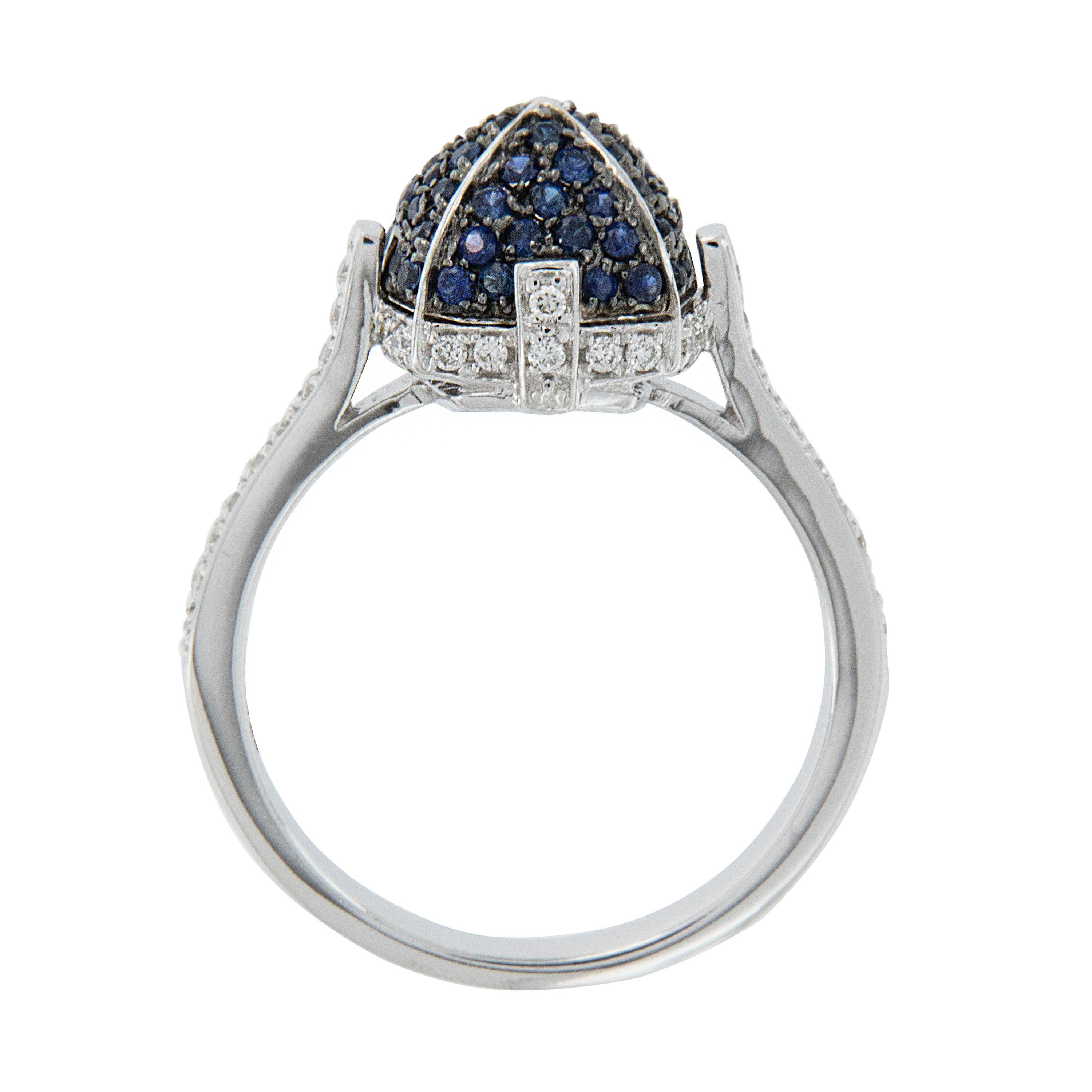 Goshwara, a term for perfect shape, is a company known for exceptional color gems and this 18 karat white gold Sugarloaf pave' ring which showcases 0.65 Cttw. blue sapphires & 0.15 Cttw diamonds shows it! 

Size 6.25, 11 x 11mm
