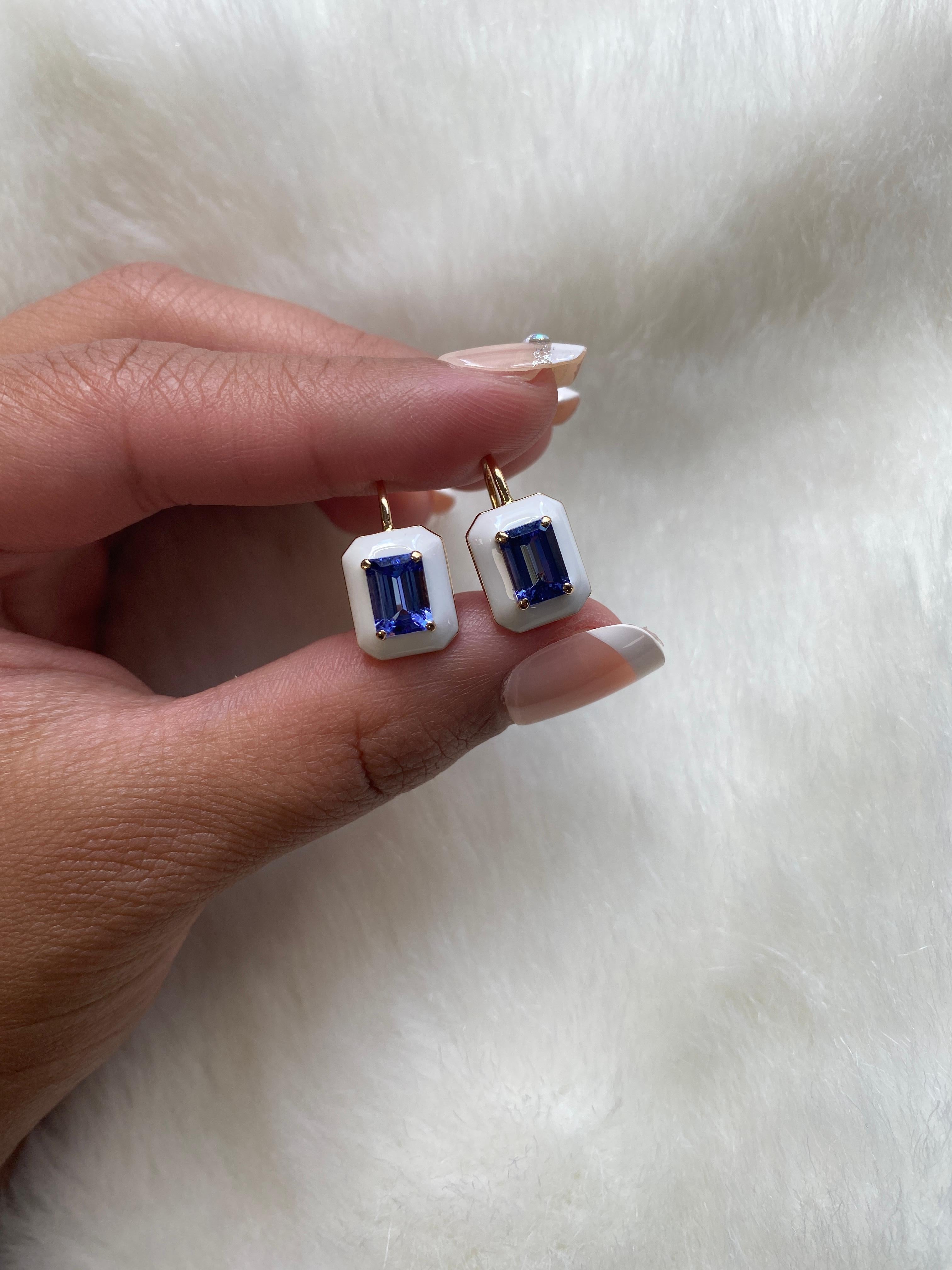 These unique earrings are a Tanzanite Emerald Cut, with White Enamel border and Lever back. From our ‘Queen’ Collection, it was inspired by royalty, but with a modern twist. The combination of enamel, and Tanzanite represents power, richness and