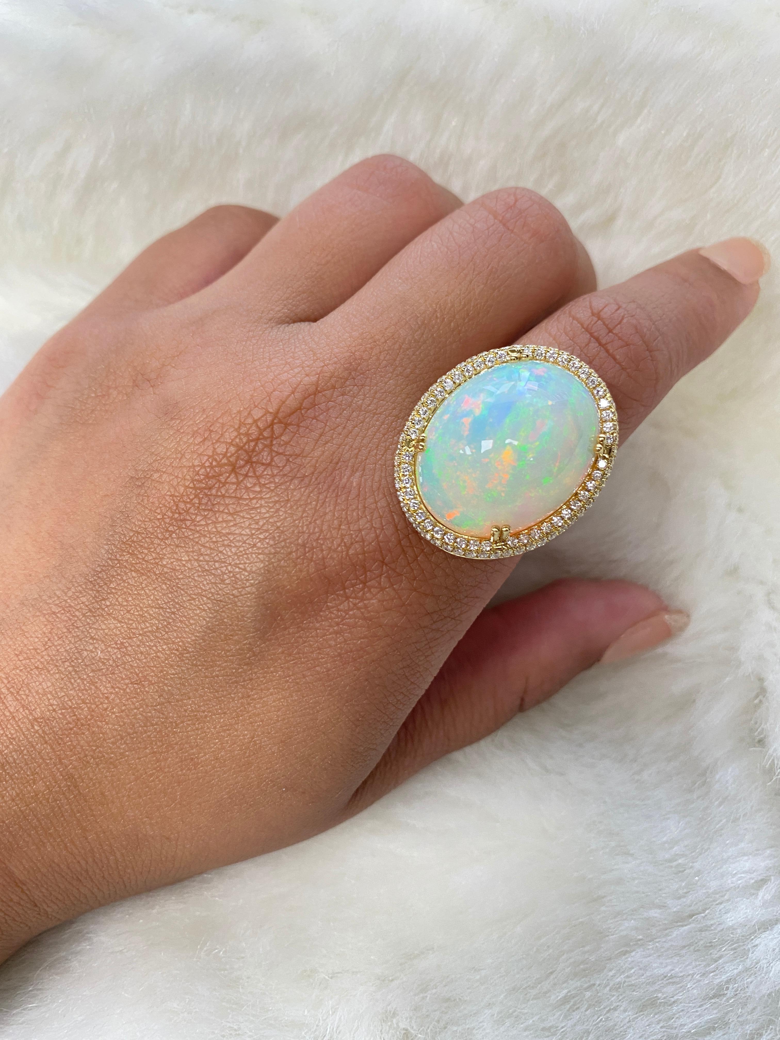 White Opal Cabochon Ring With Diamond in 18K Yellow Gold, from 'G-One' Collection

Stone size: 24 X 19 mm

Gemstone Weight: 19.20 Carat

Diamonds G-H / VS Approx Wt: 1.12 Carat