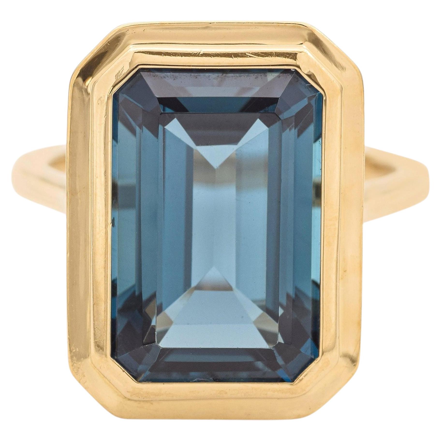 Bague cocktail en or jaune Goshwara avec topaze bleue