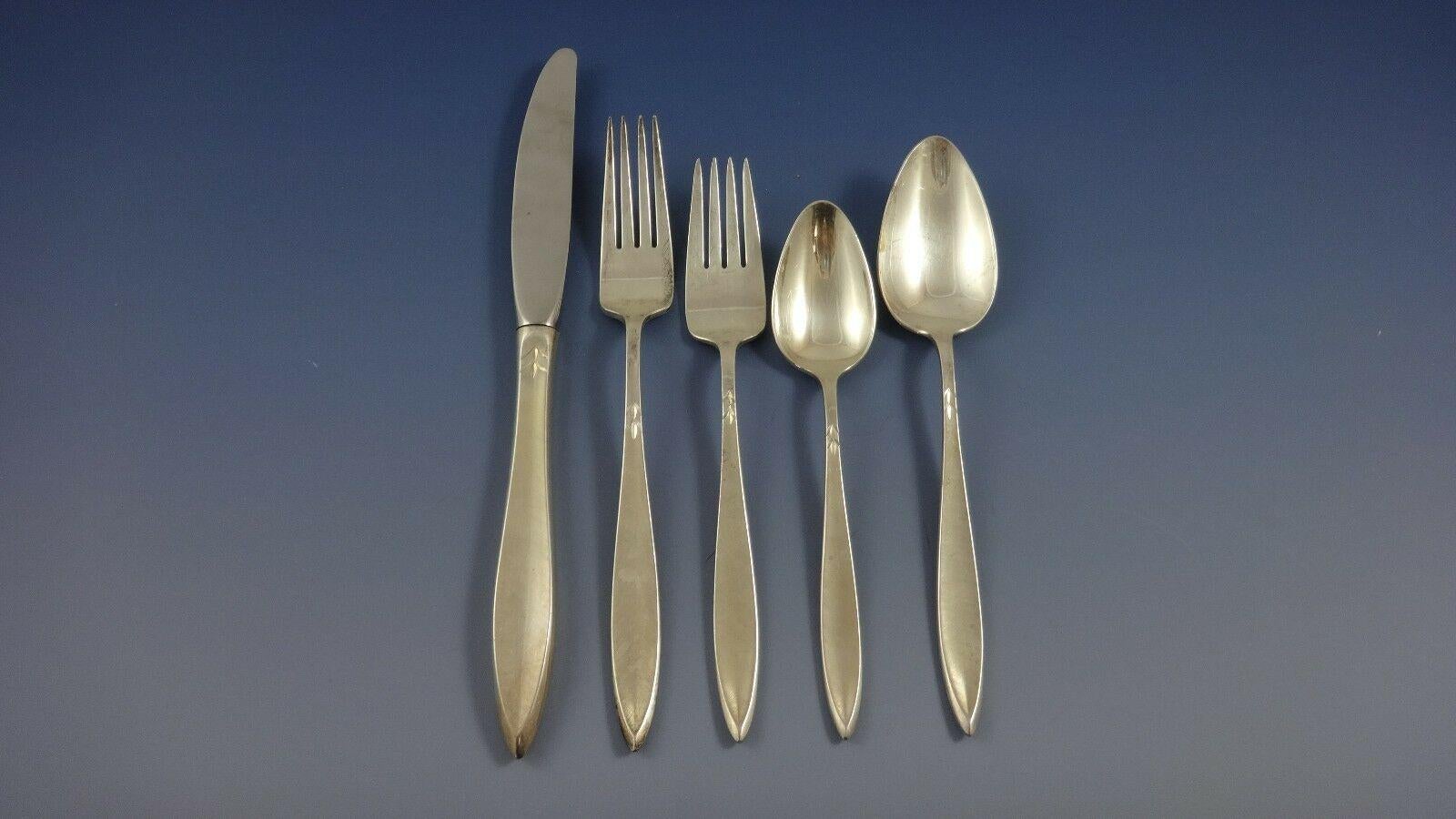 Simple and modern Gossamer by Gorham Sterling Silver flatware set - 70 pieces. This set includes:

12 knives, 8 7/8
